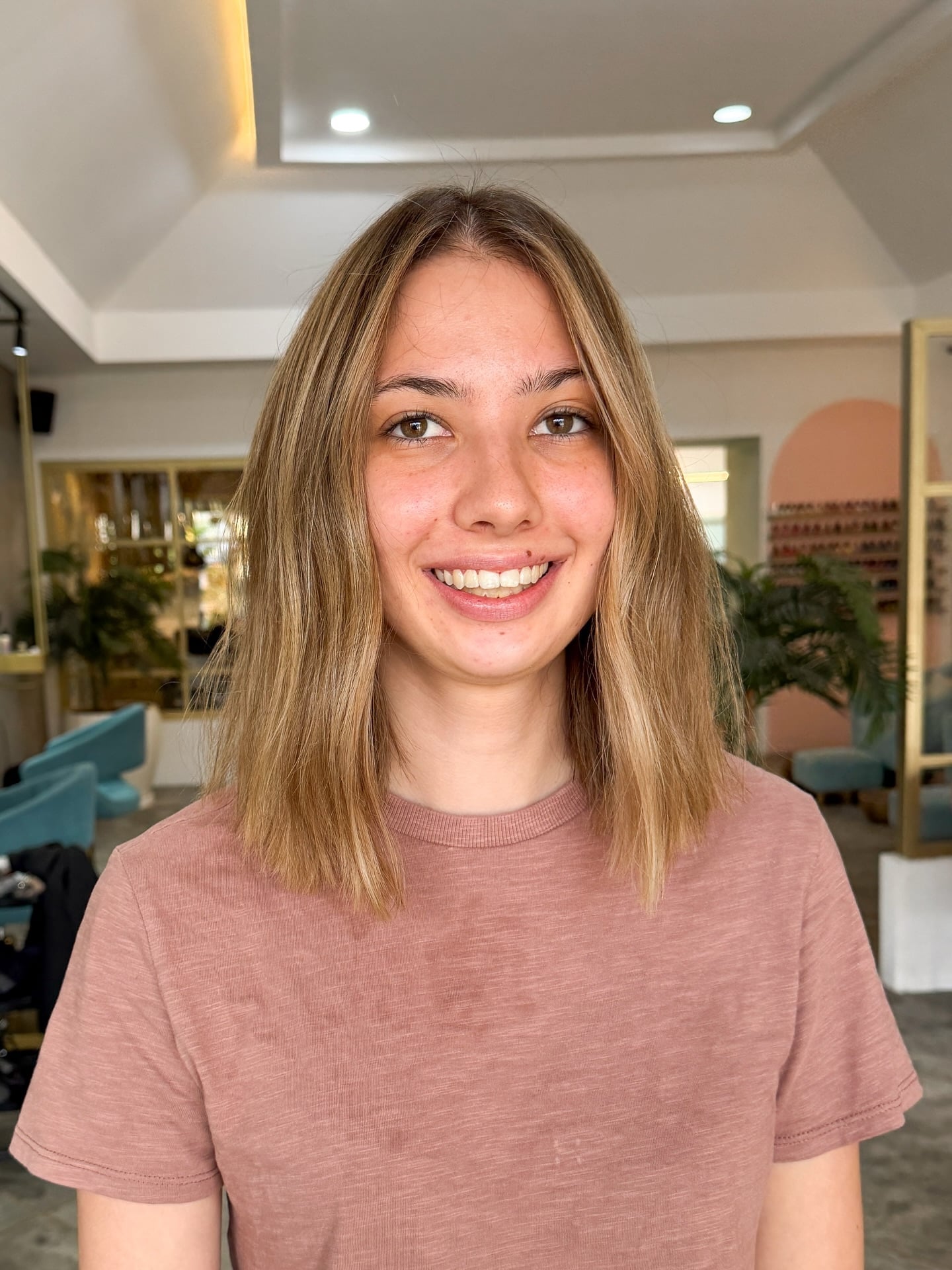 Casual dirty blonde shoulder-length cut with texture