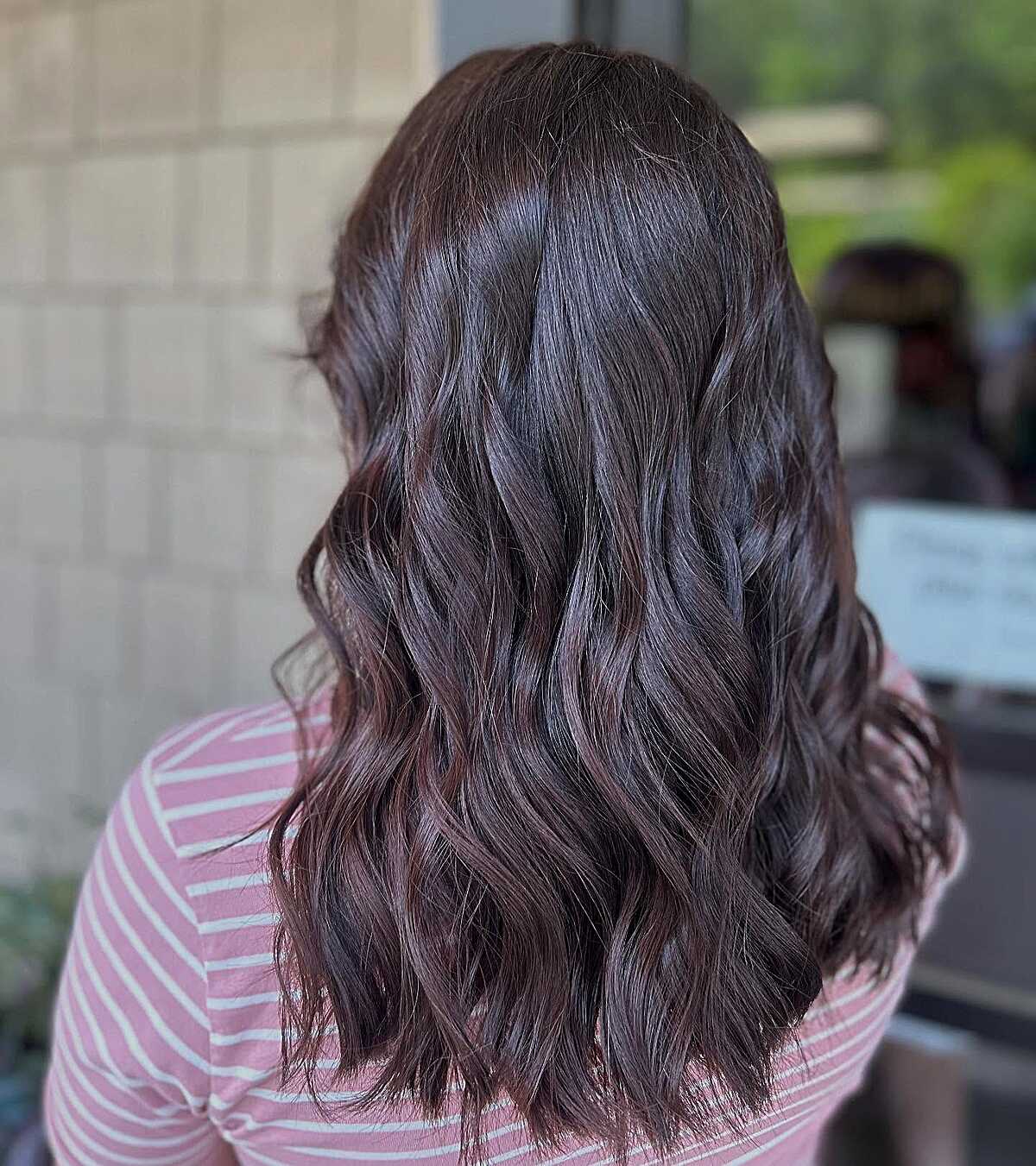 Dark brunette with subtle blackberry violet undertones
