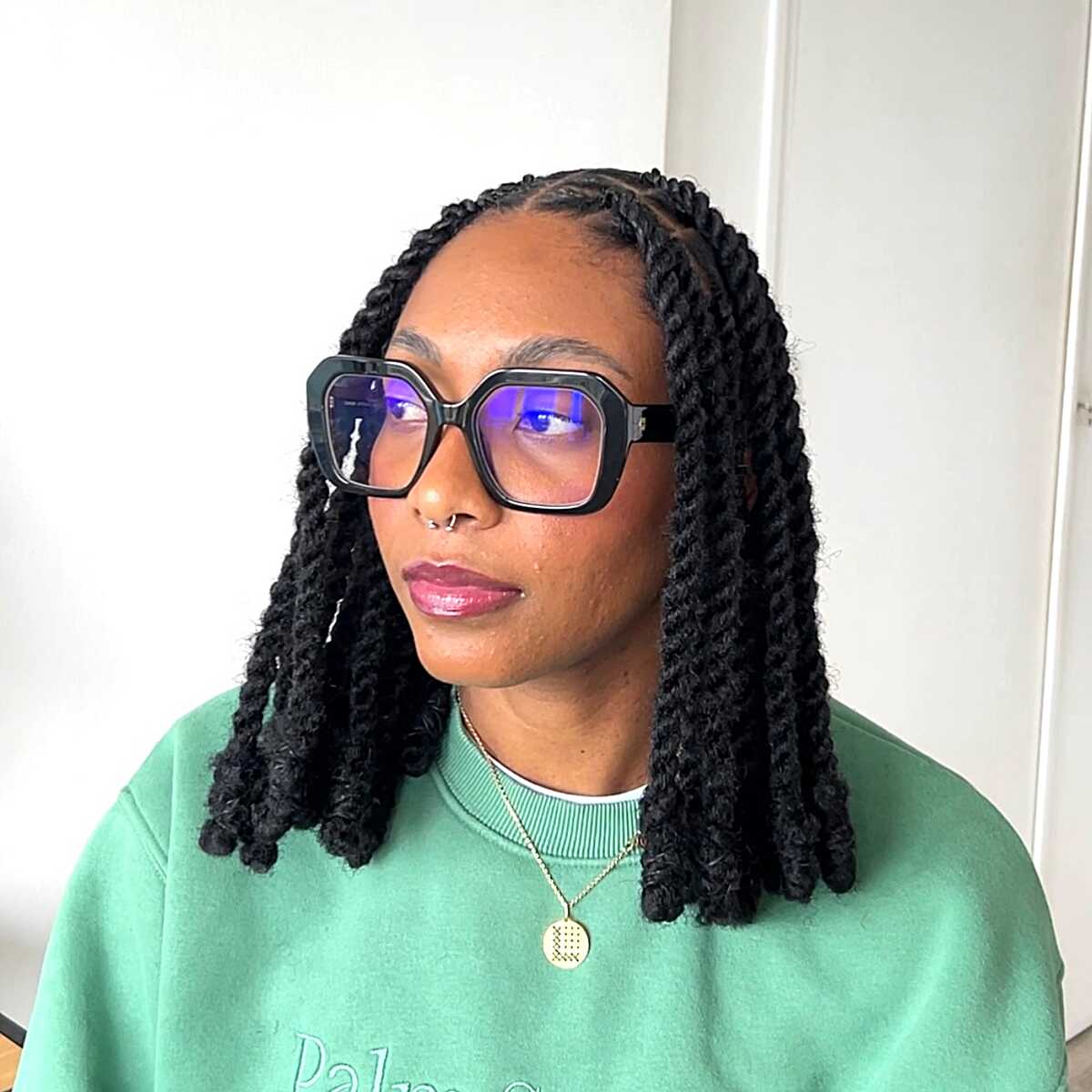 Thick black Havana twists with a center part