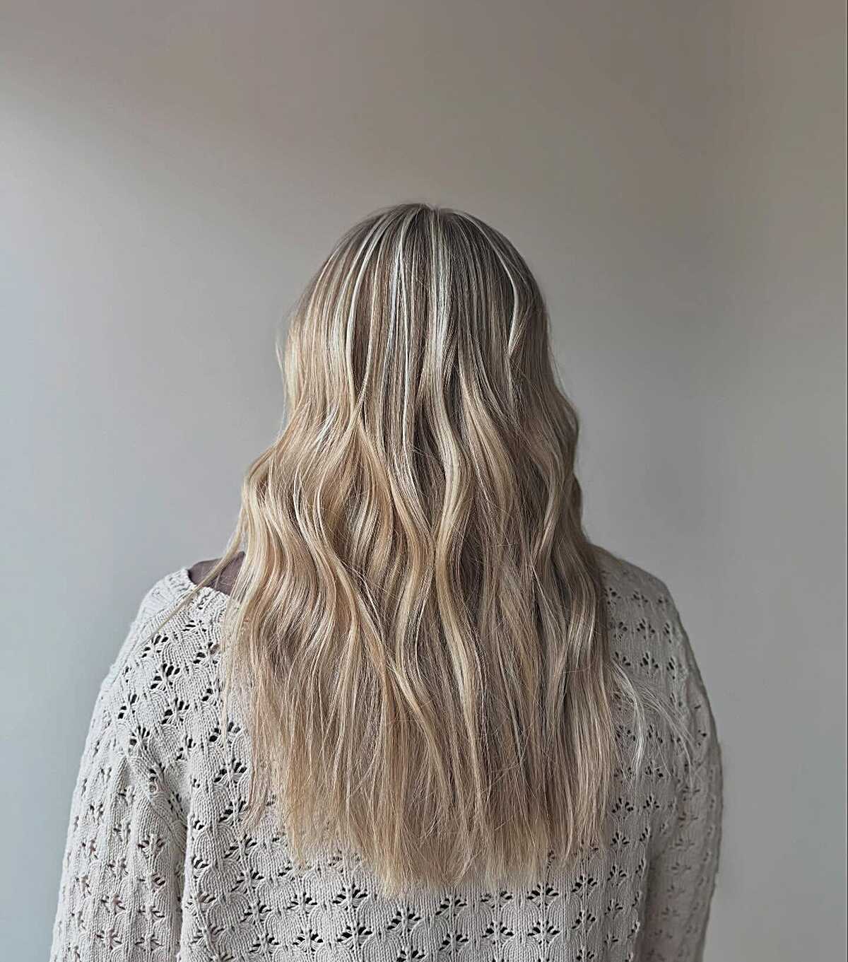 Medium length lived-in bronde waves with ribbon highlights