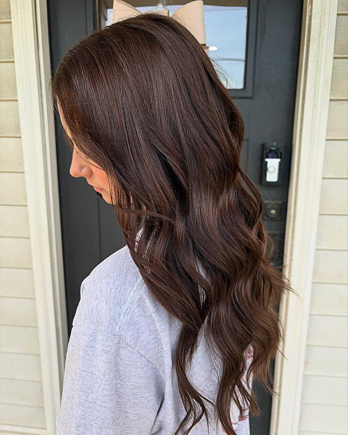 Rich cherry cola brunette waves with deep dark roots
