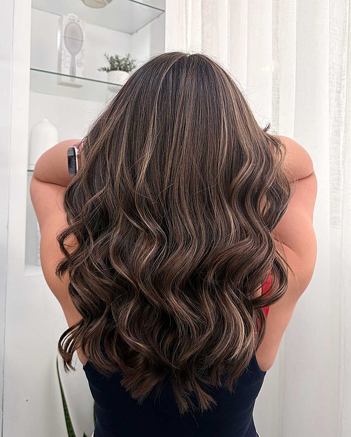 Chocolate brunette with champagne blonde balayage accents