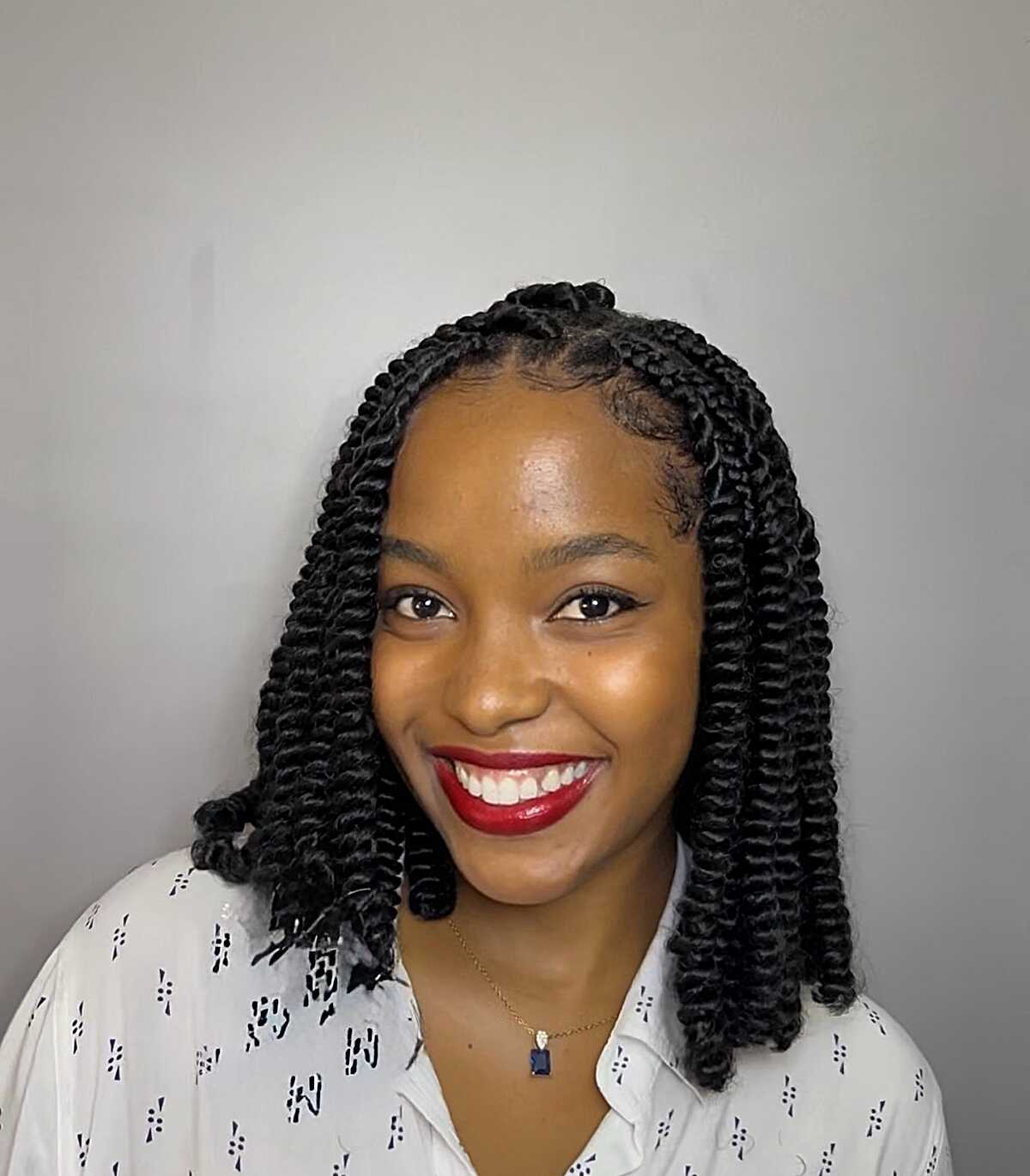Chunky black two-strand twists at chin length