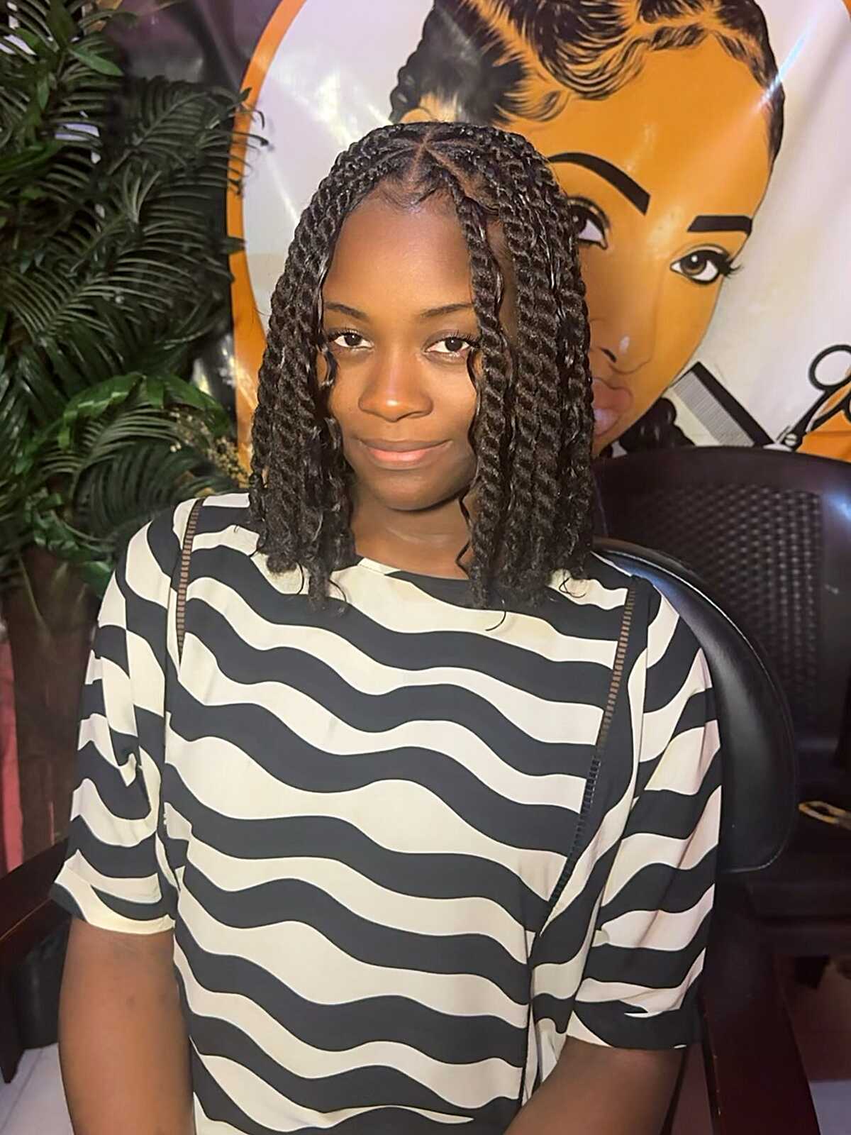 Medium two-strand twists at bob length in dark brown