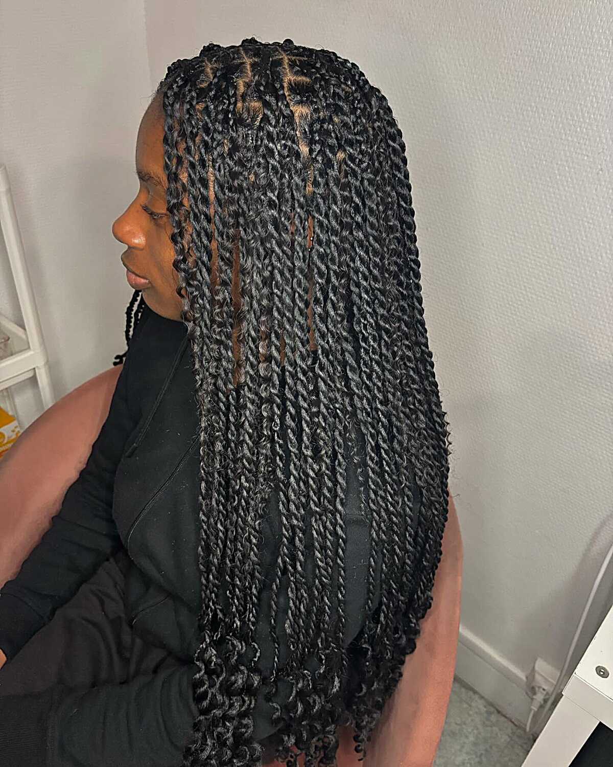 Long dense jet black Senegalese twists past shoulders