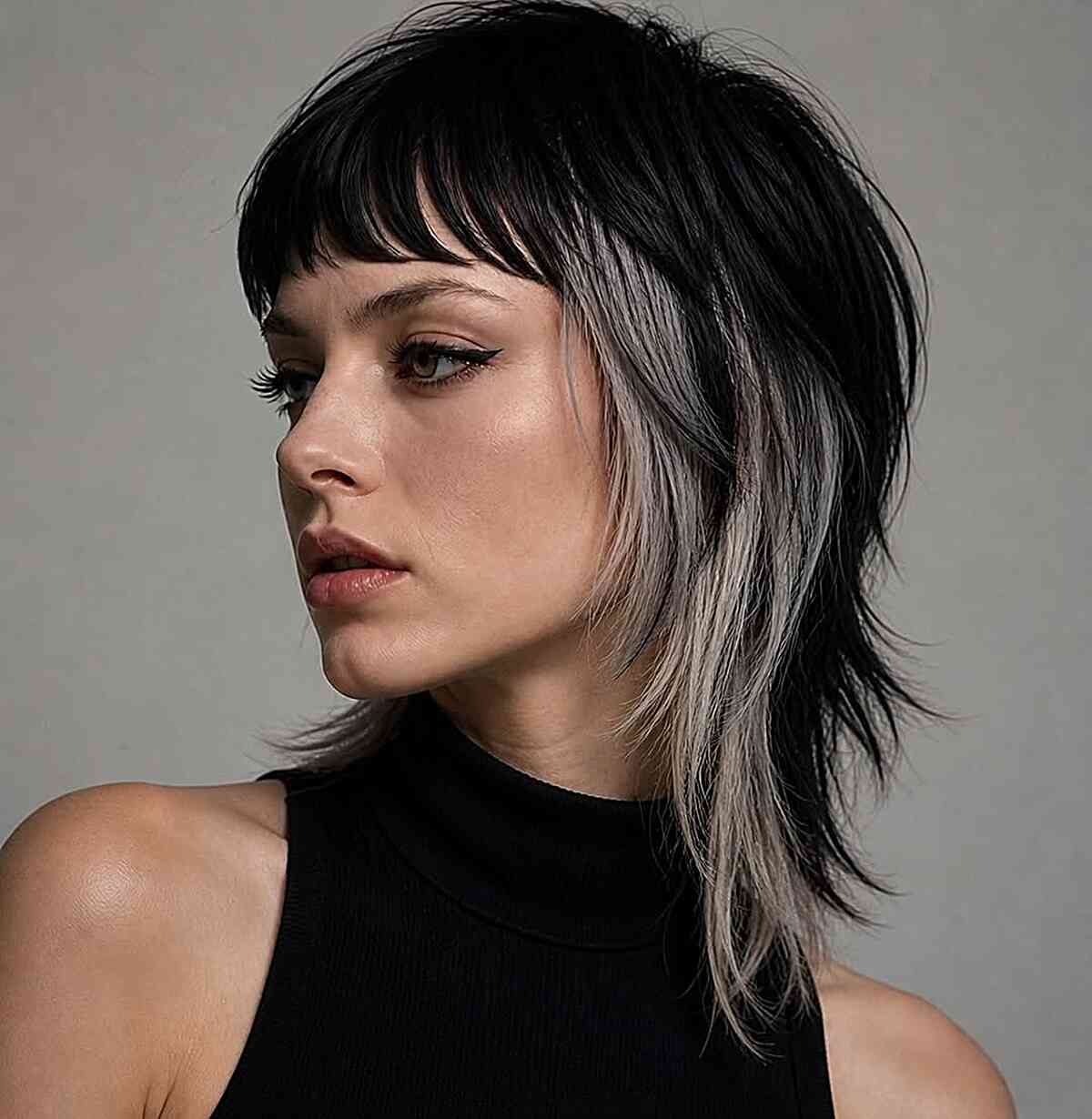 Edgy Gothic Mullet with Bold Color Contrast