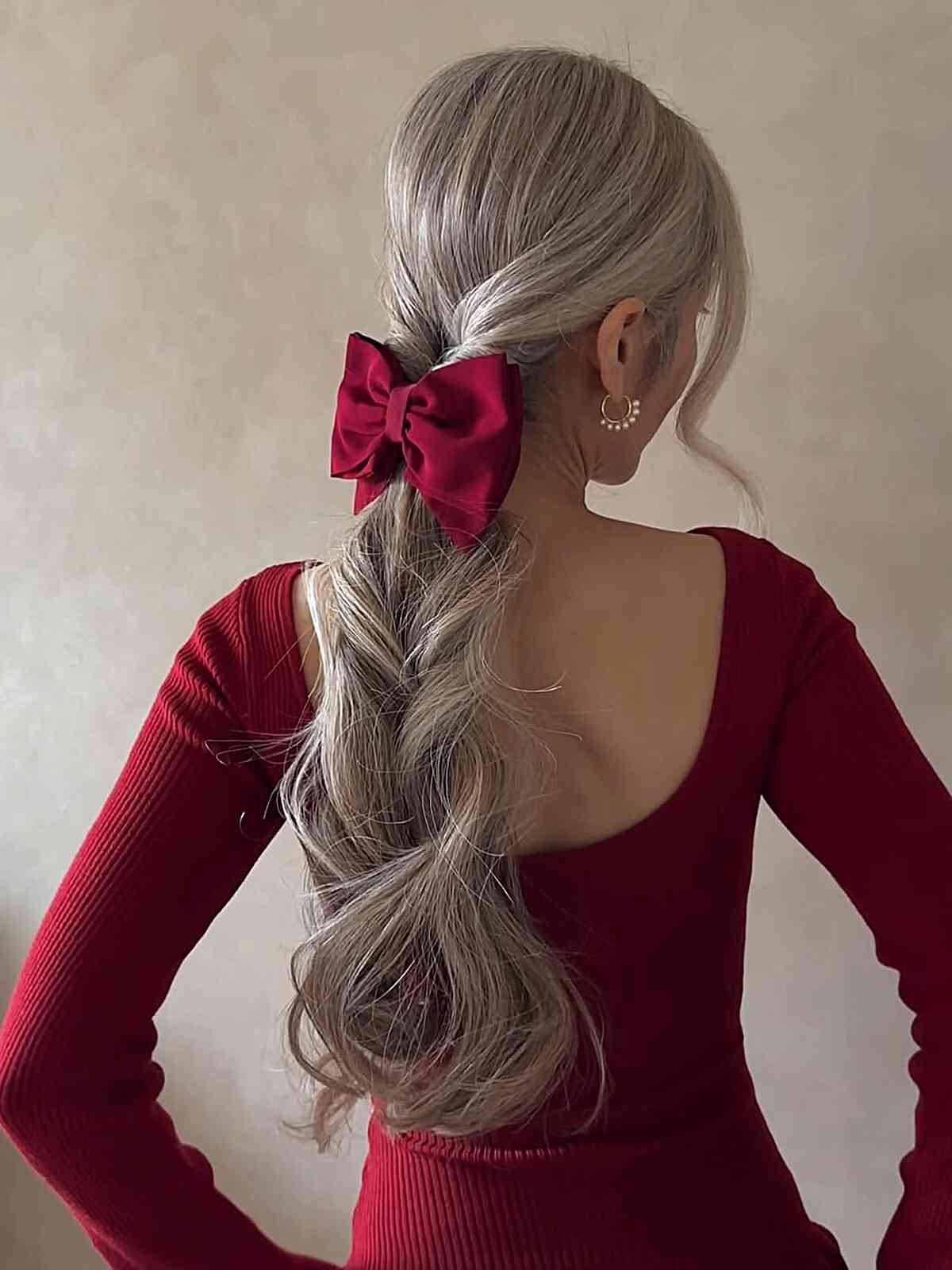 Elegant Long Wavy Ponytail with Bow
