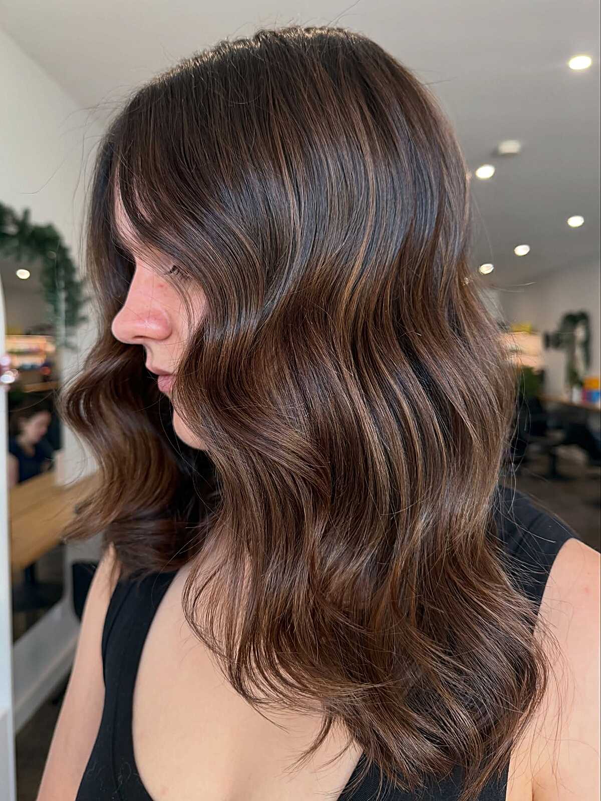 Dark espresso brunette with caramel face-framing pieces