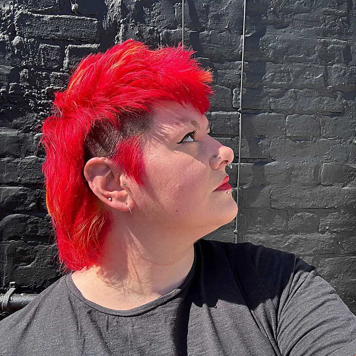 Bright red mohawk mullet with shaved sides