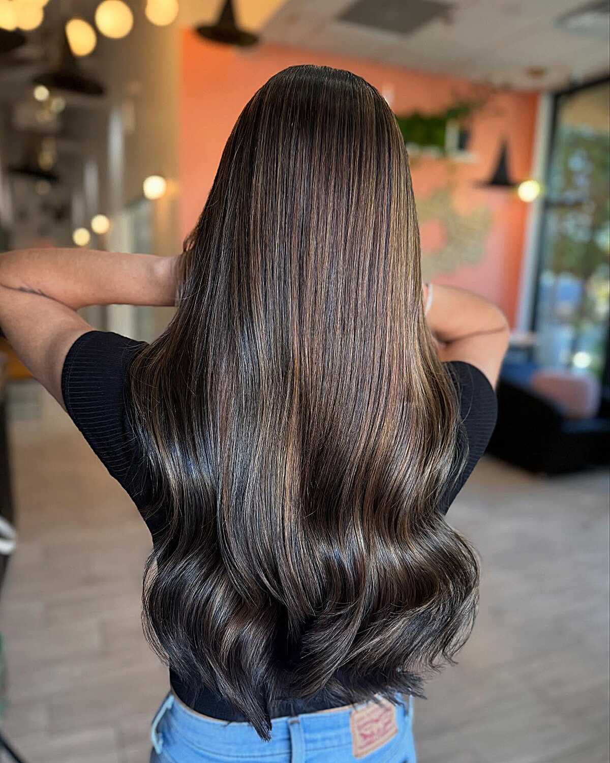 Sleek dark espresso brunette with glass-like shine