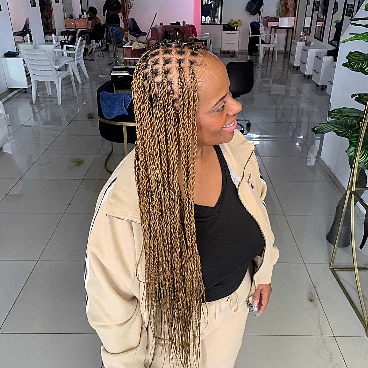 Long golden blonde Senegalese twists past the waist