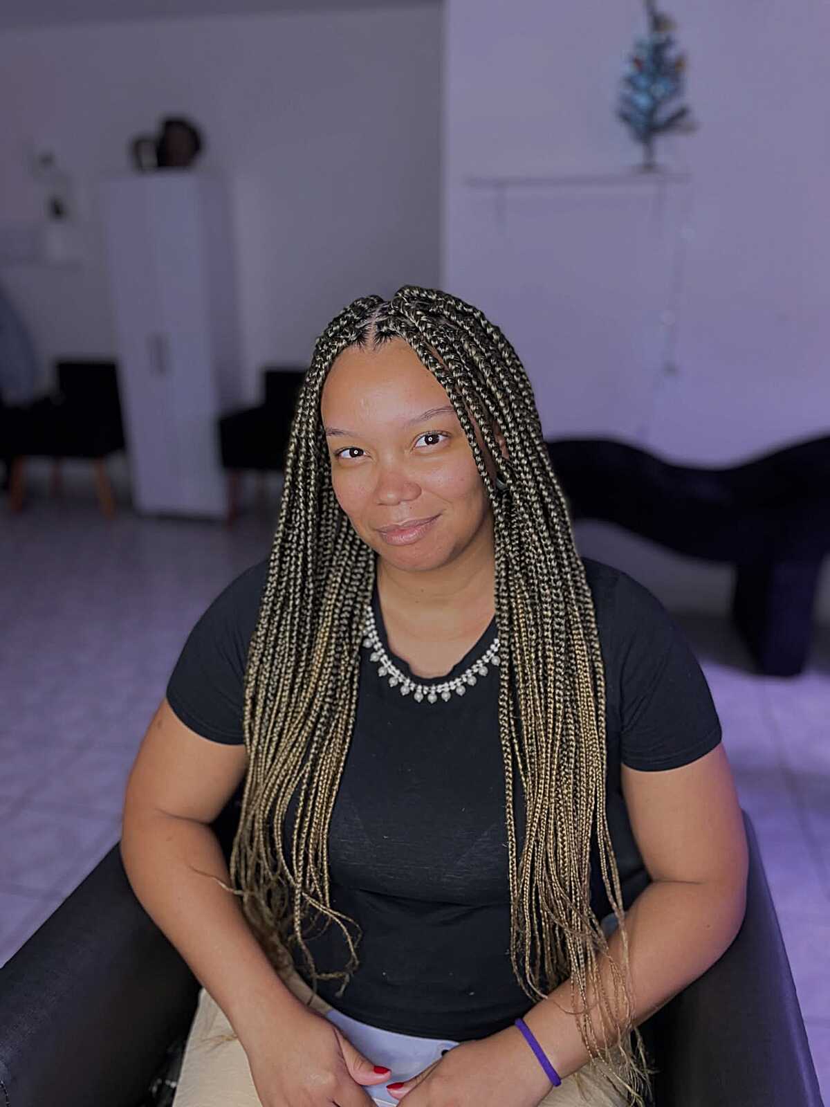 Waist-length box braids with blonde and honey ombre