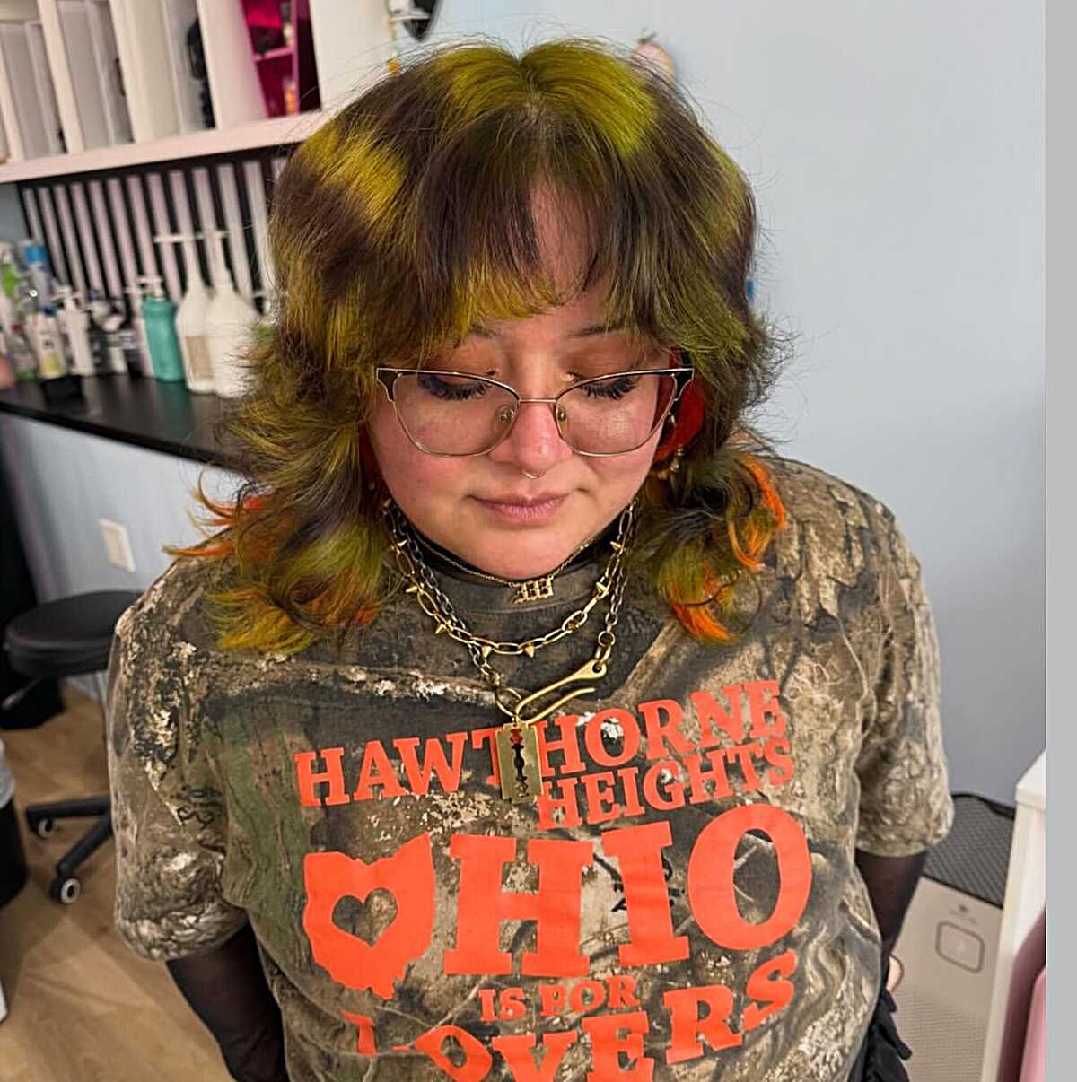 Shaggy medium cut in olive green with orange tips