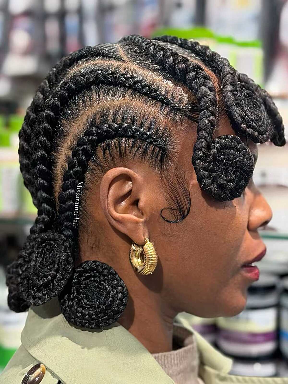 Cornrows ending in Bantu knots around the head