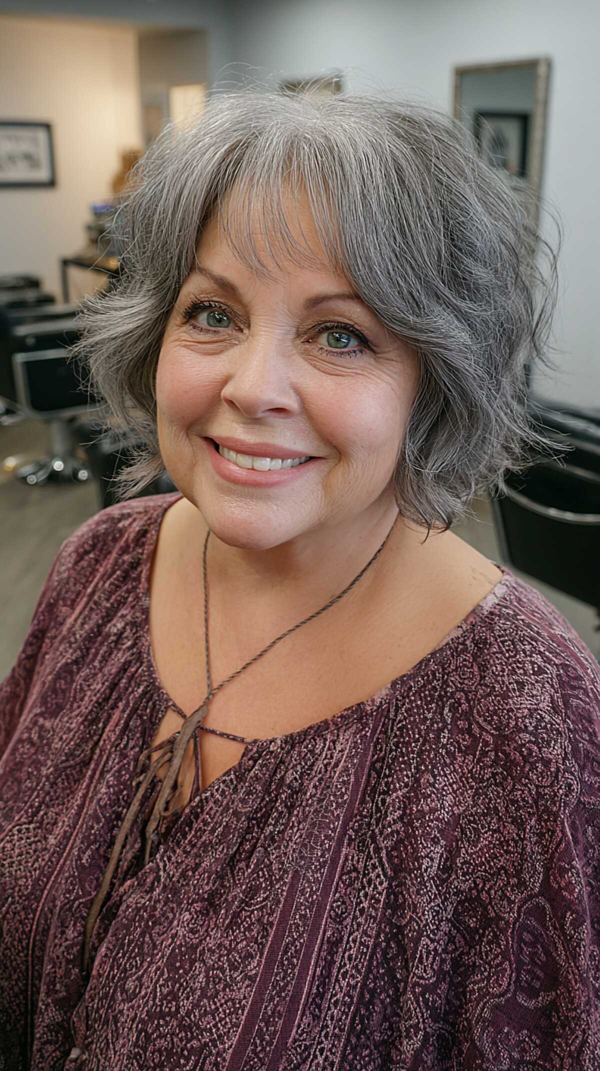Textured silver gray bob with feathered wispy fringe