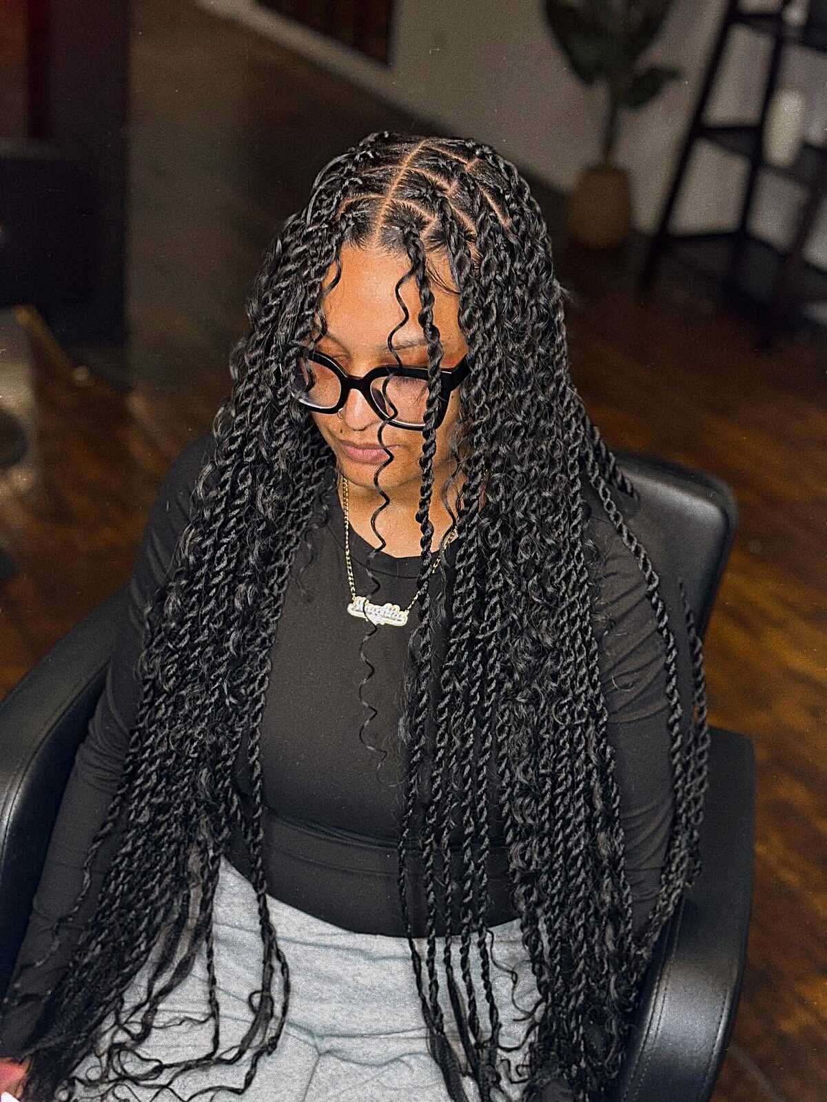 Long knotless twists with curly face-framing pieces