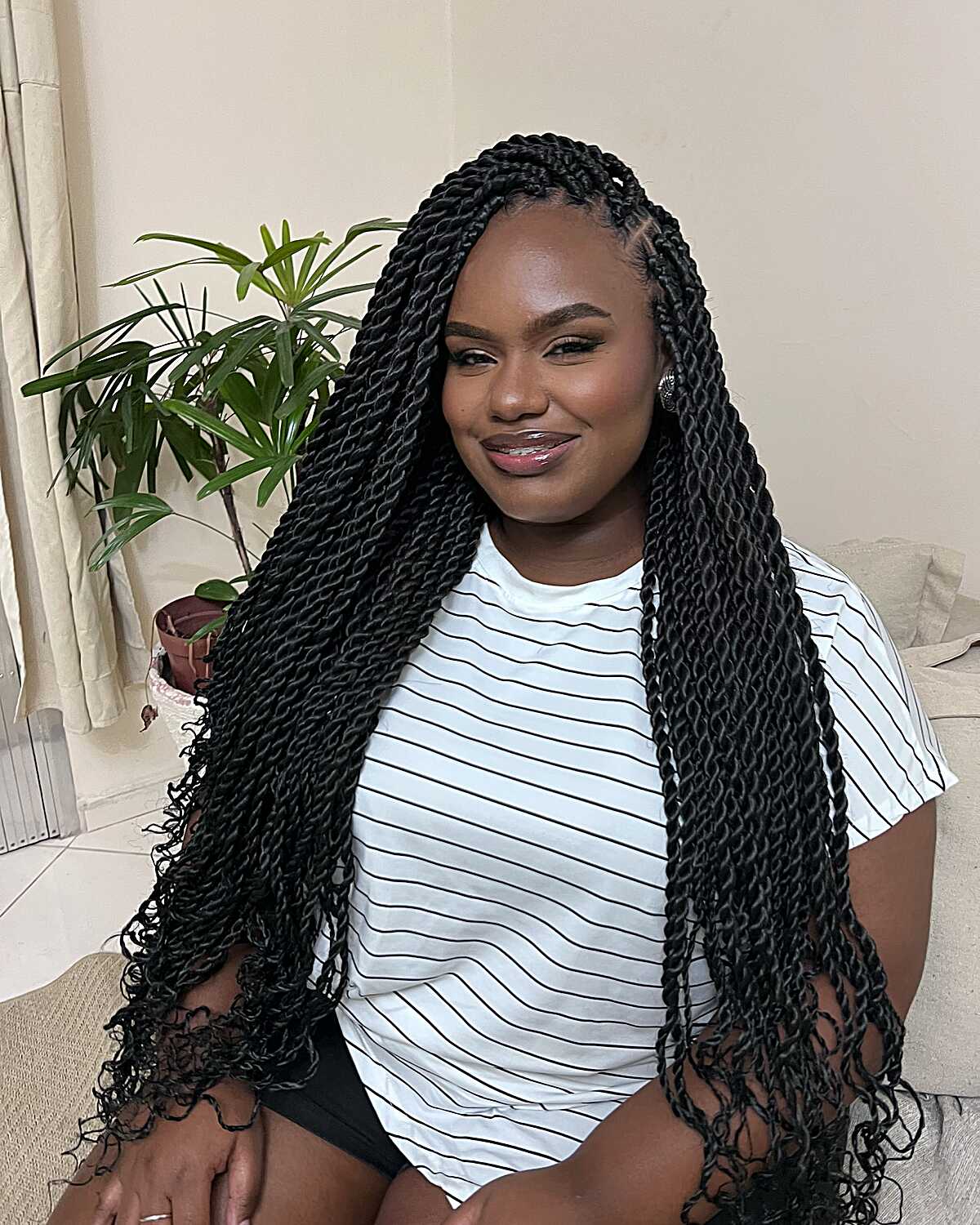 Long black Senegalese twists with curly tips