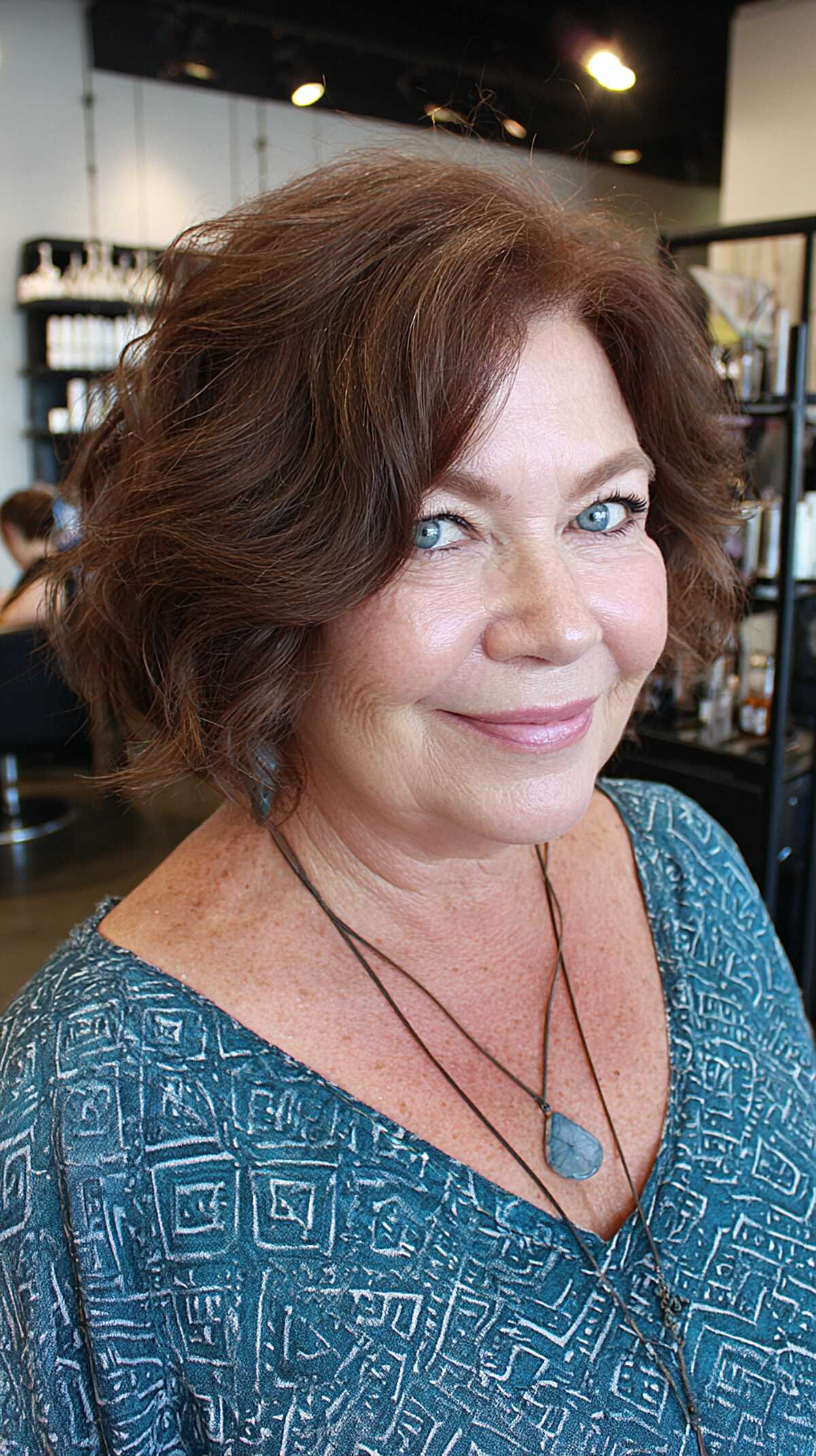 Warm cinnamon brown wavy bob with height at crown