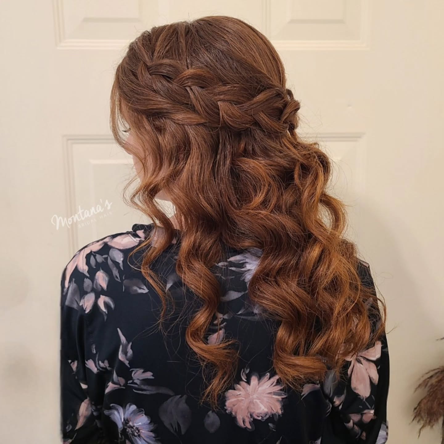 Waterfall braid half-up style with auburn curled ends