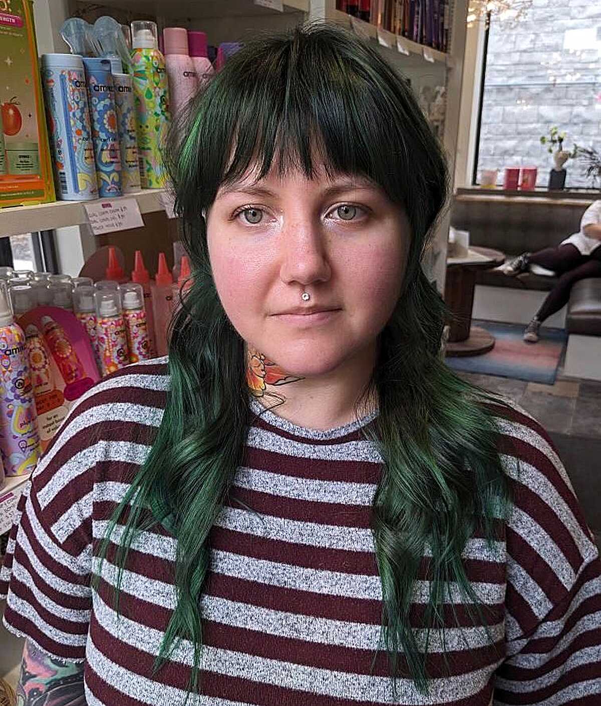 Forest green wavy shag with choppy bangs