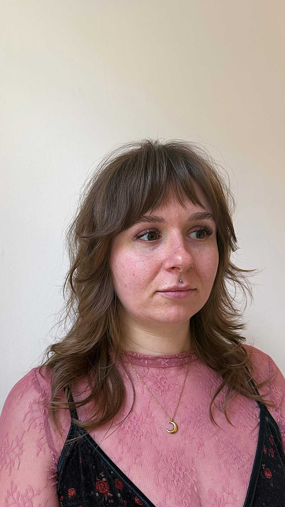 Light brown wavy shag with feathered bangs