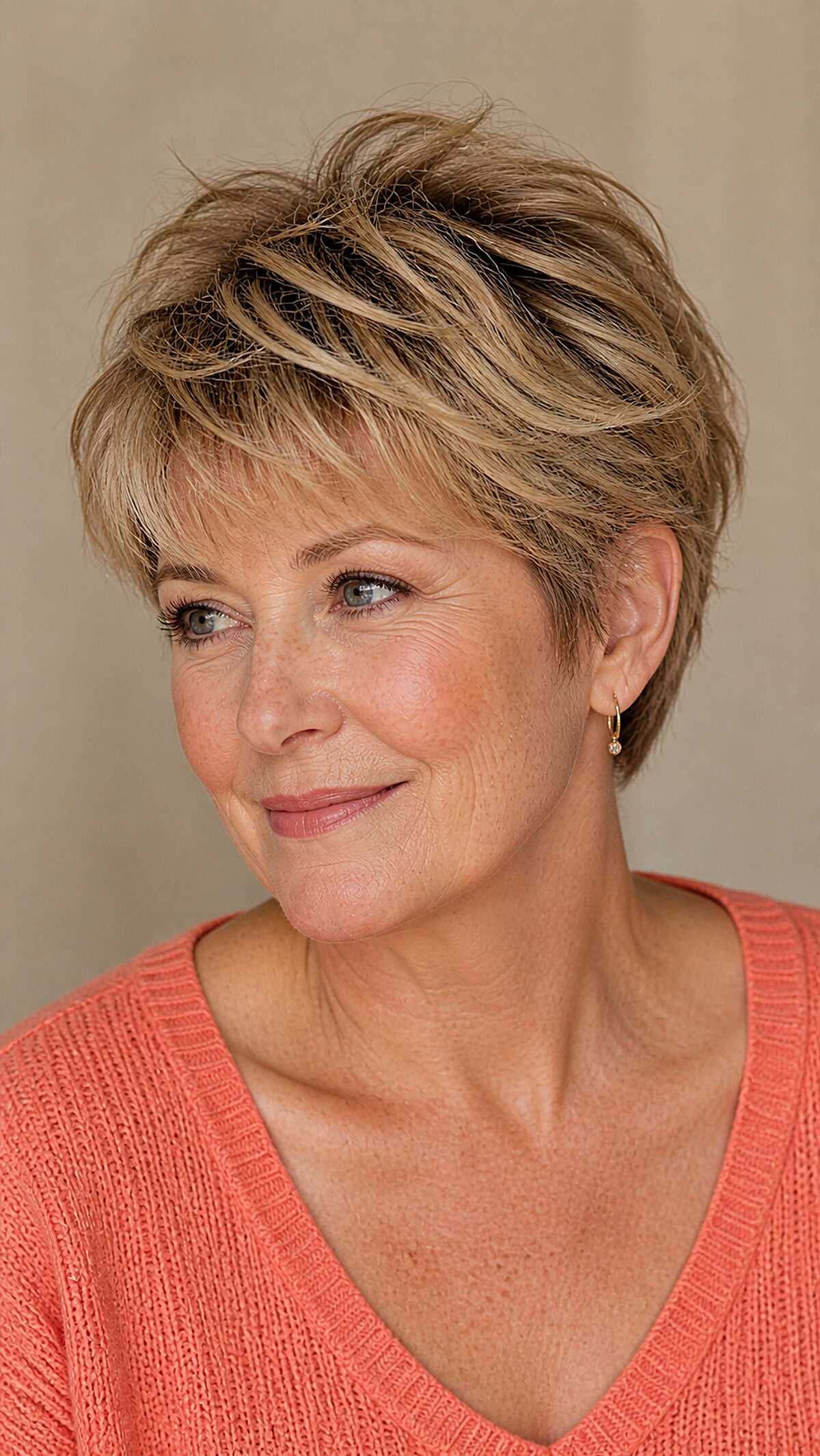 Honey-highlighted short pixie with feathered bangs
