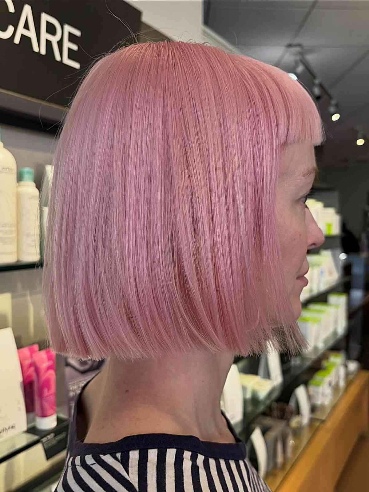 Trendy Light Pink Blunt Bob with Fringe