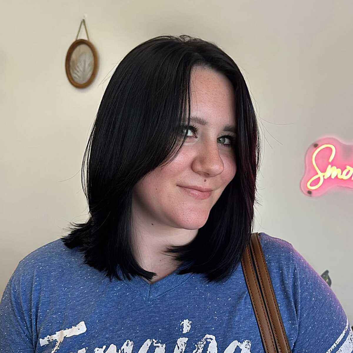 Layered jet black lob with face framing pieces