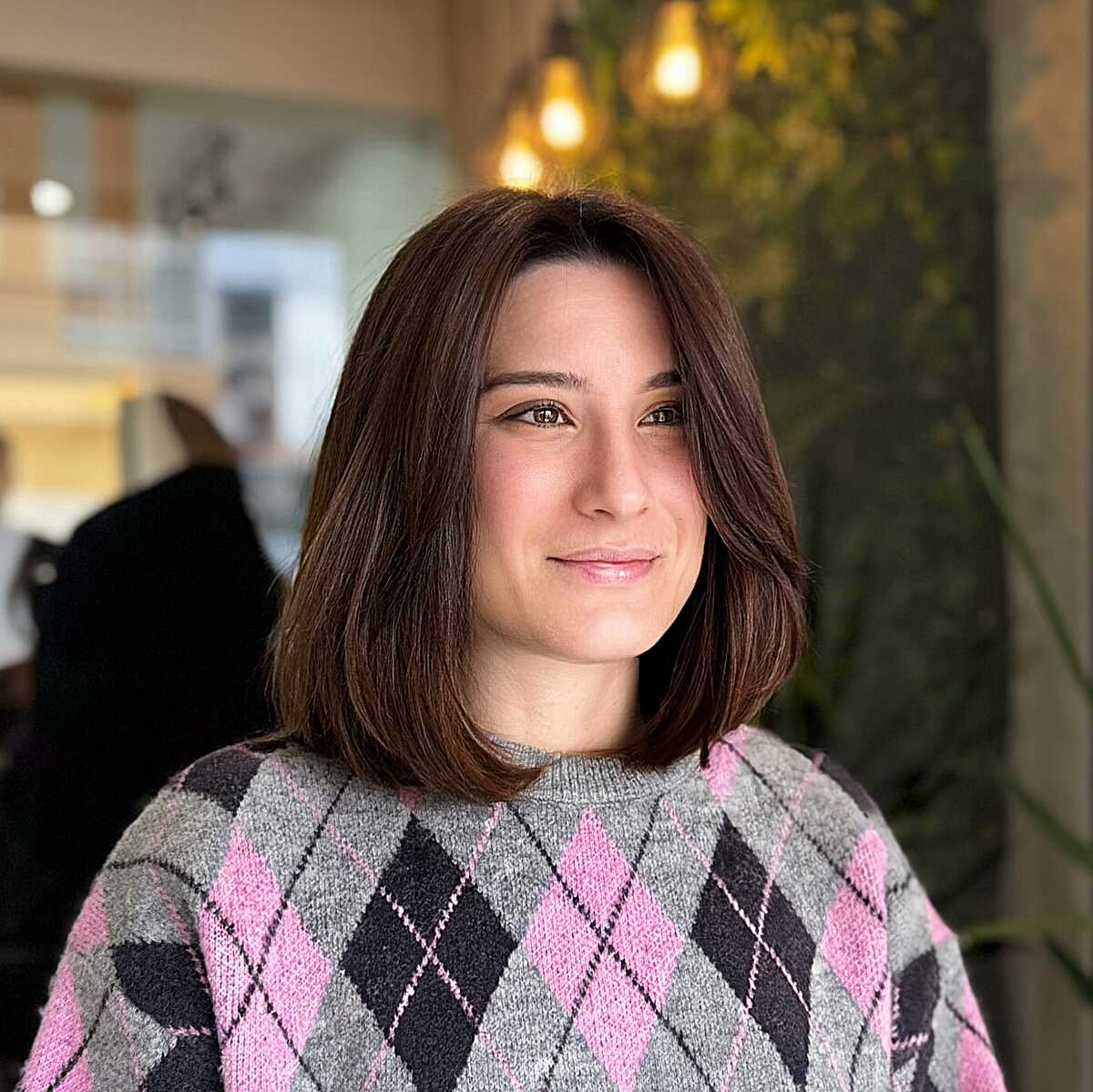 Medium brown subtle A-line lob with flicked ends