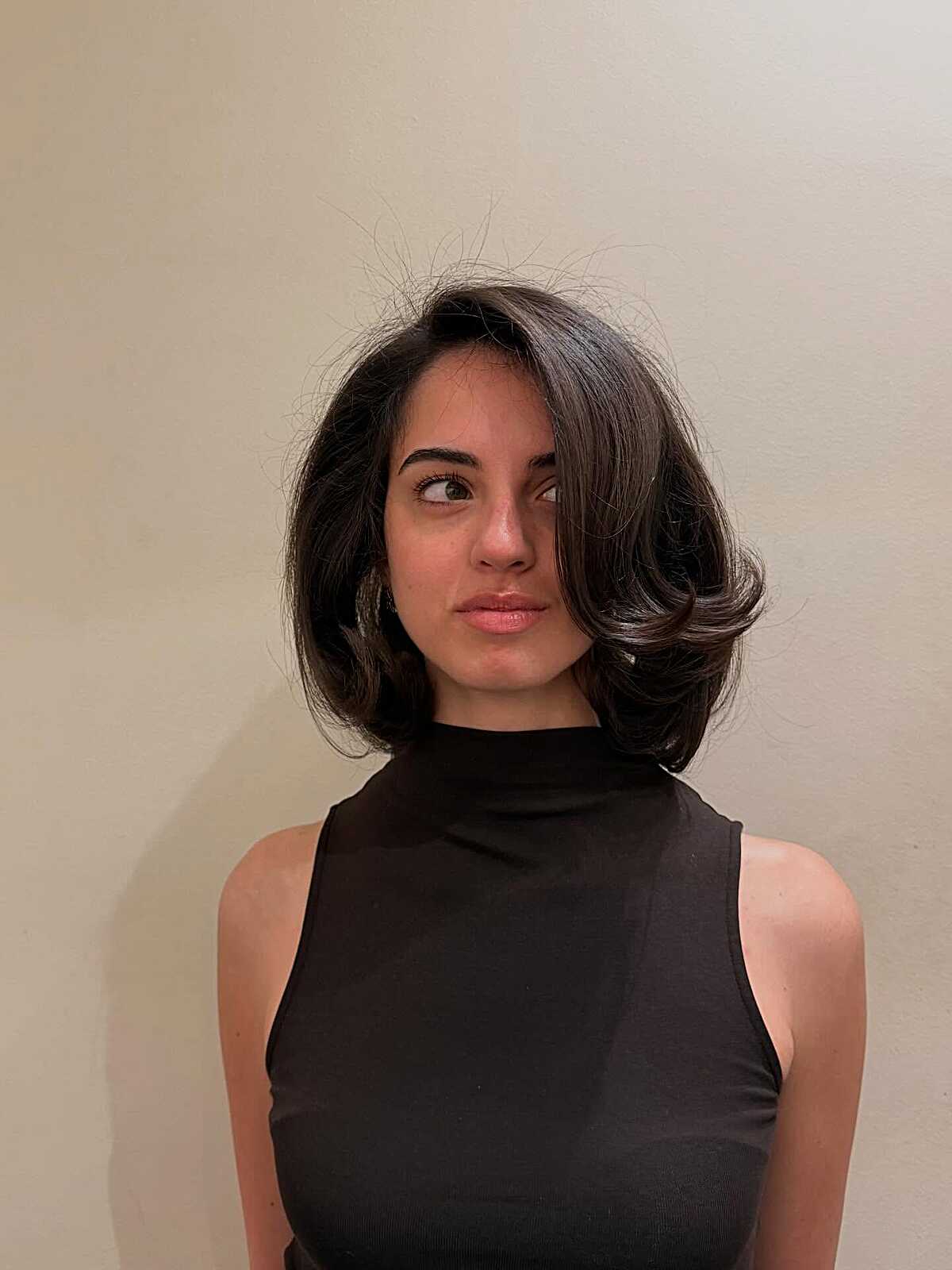 Dark brown voluminous lob with flipped out ends