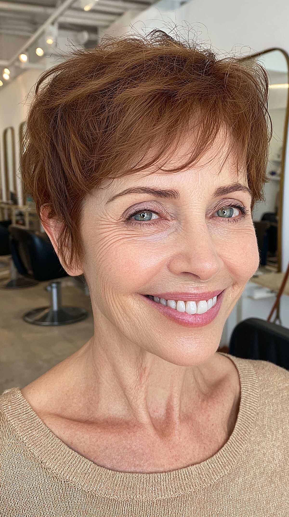 Copper pixie cut with windswept textured layers