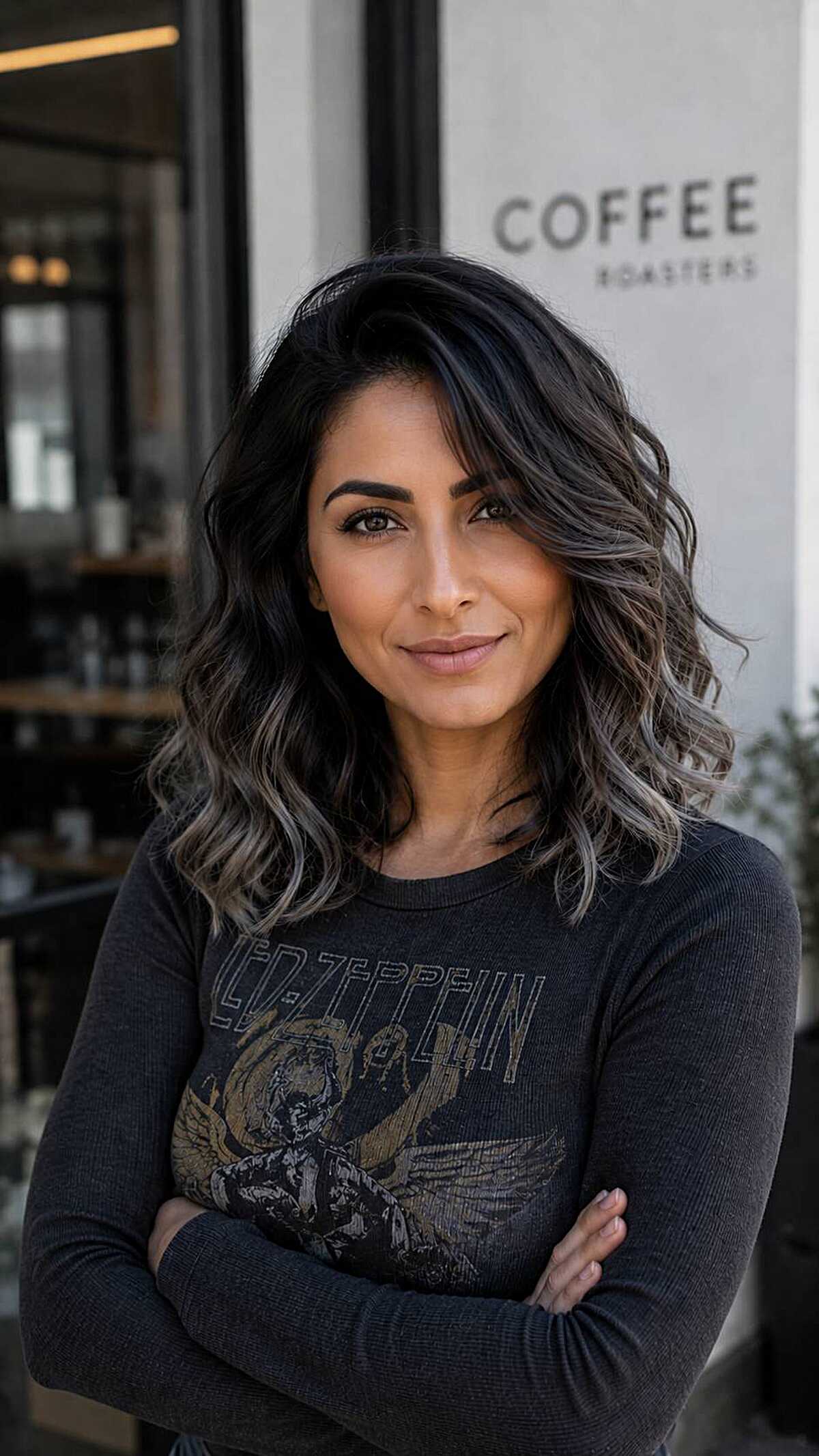 Dark wavy medium hair with ash silver highlights and side part