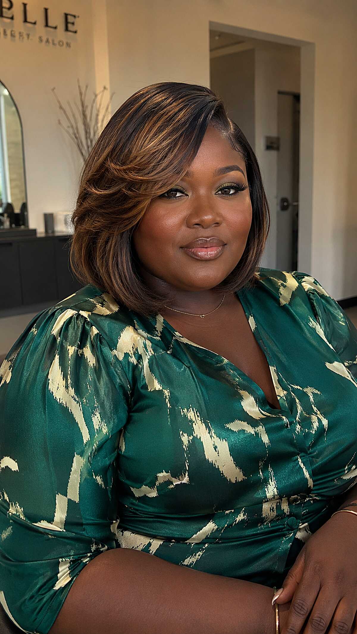 Short bob quick weave with honey highlights and deep side part