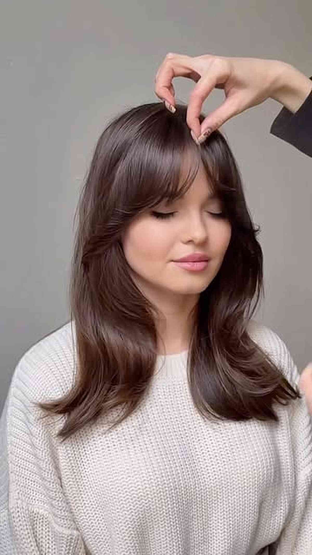 Long Brown Hair with Curtain Bangs and Layers