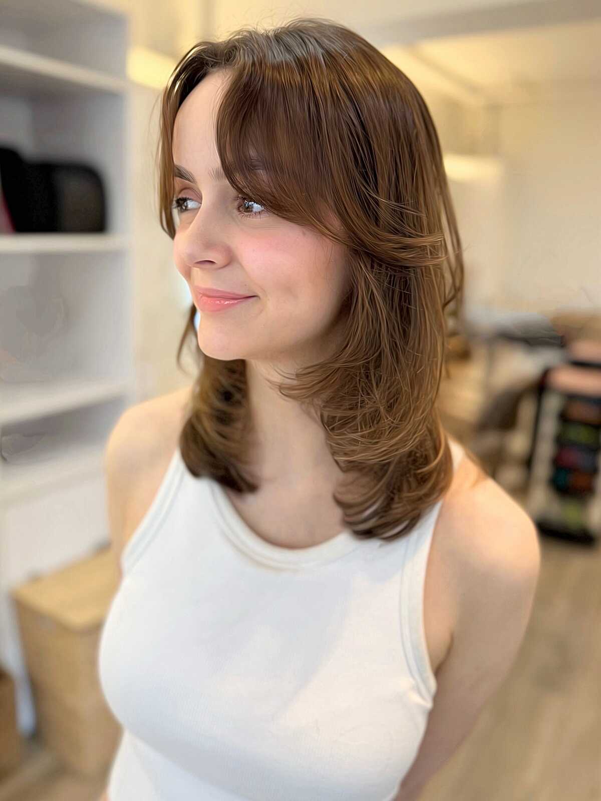Warm Brunette Butterfly Layers with Curtain Bangs
