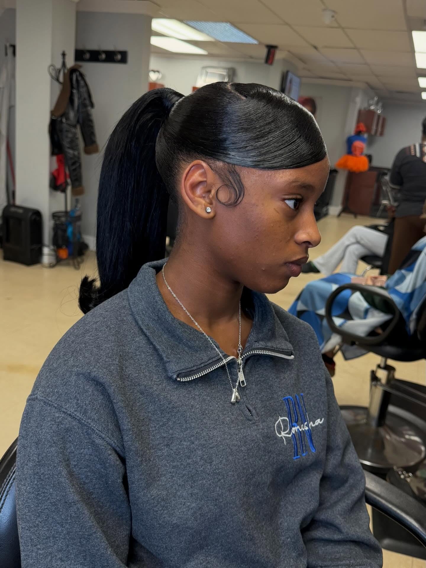 Classic Sleek High Ponytail with Swirl Baby Hair