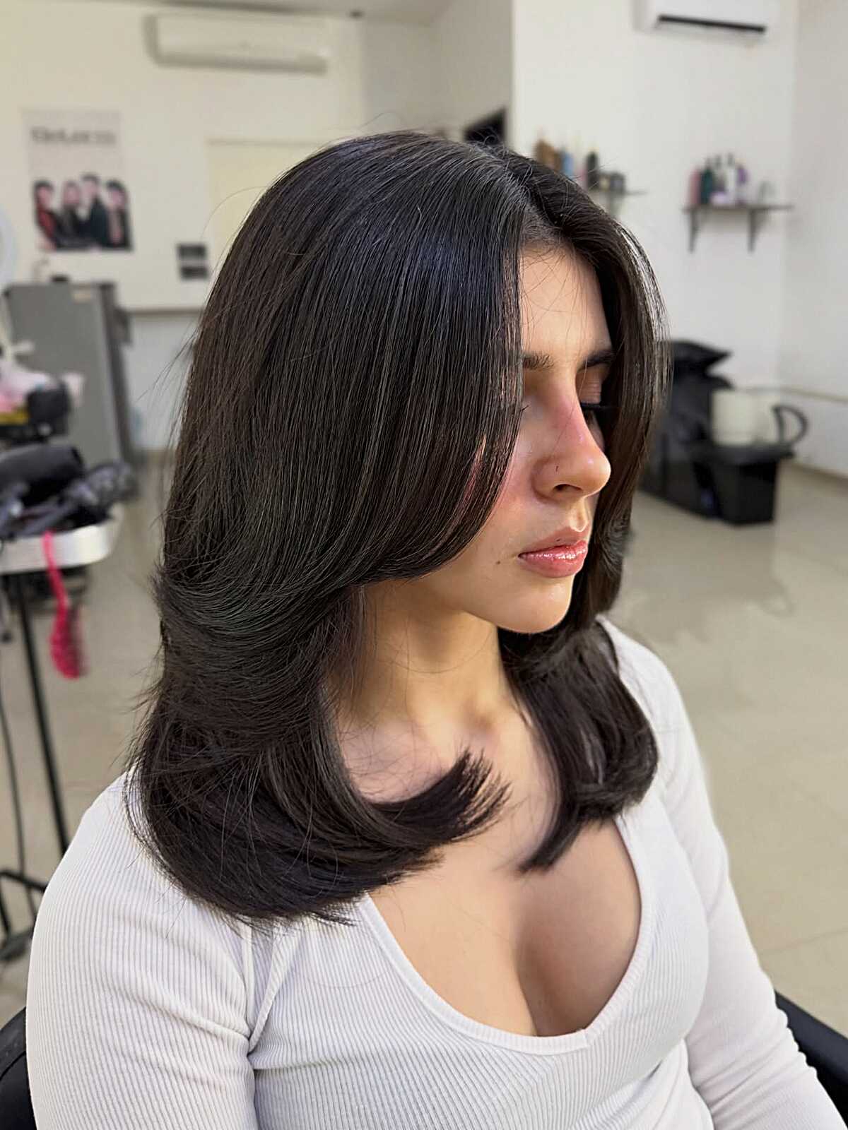 Dark brown mid length blowout with flipped ends