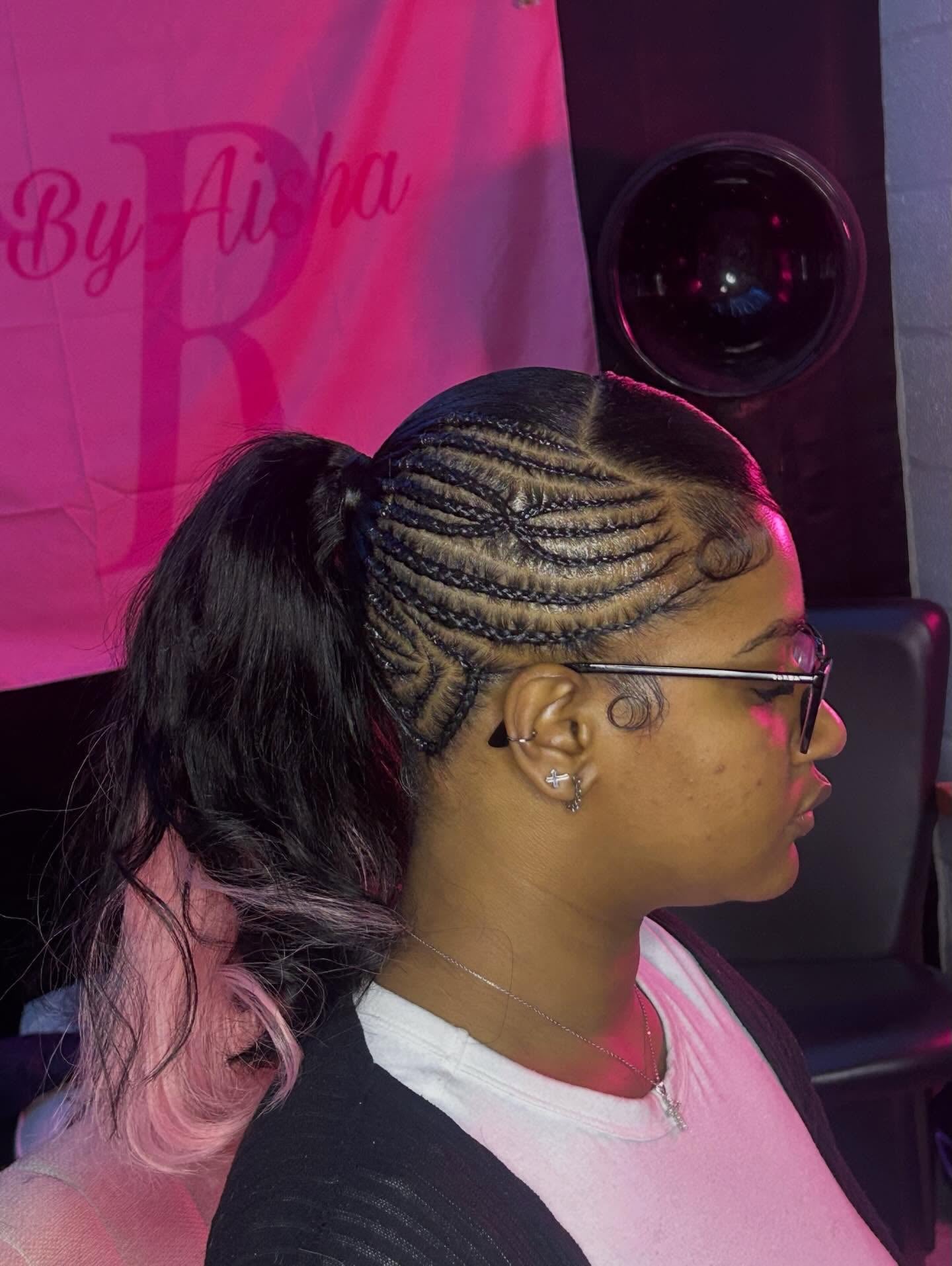 Feed-In Cornrows Leading to Wavy Low Ponytail