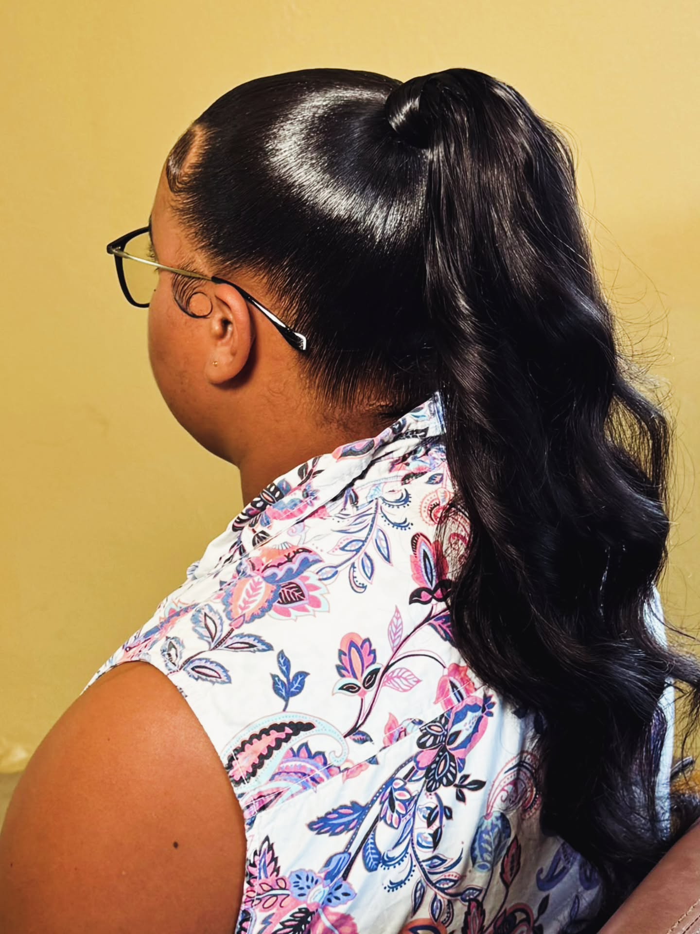 High Wavy Ponytail with Slicked Base and Edges