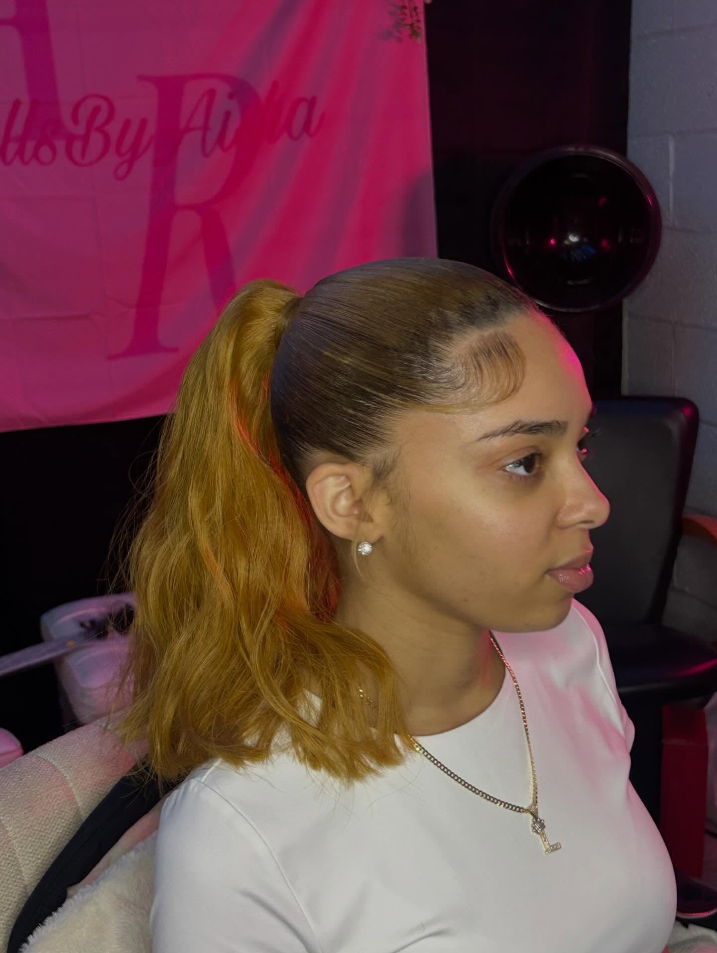 Honey Blonde Sleek Ponytail with Soft Waves