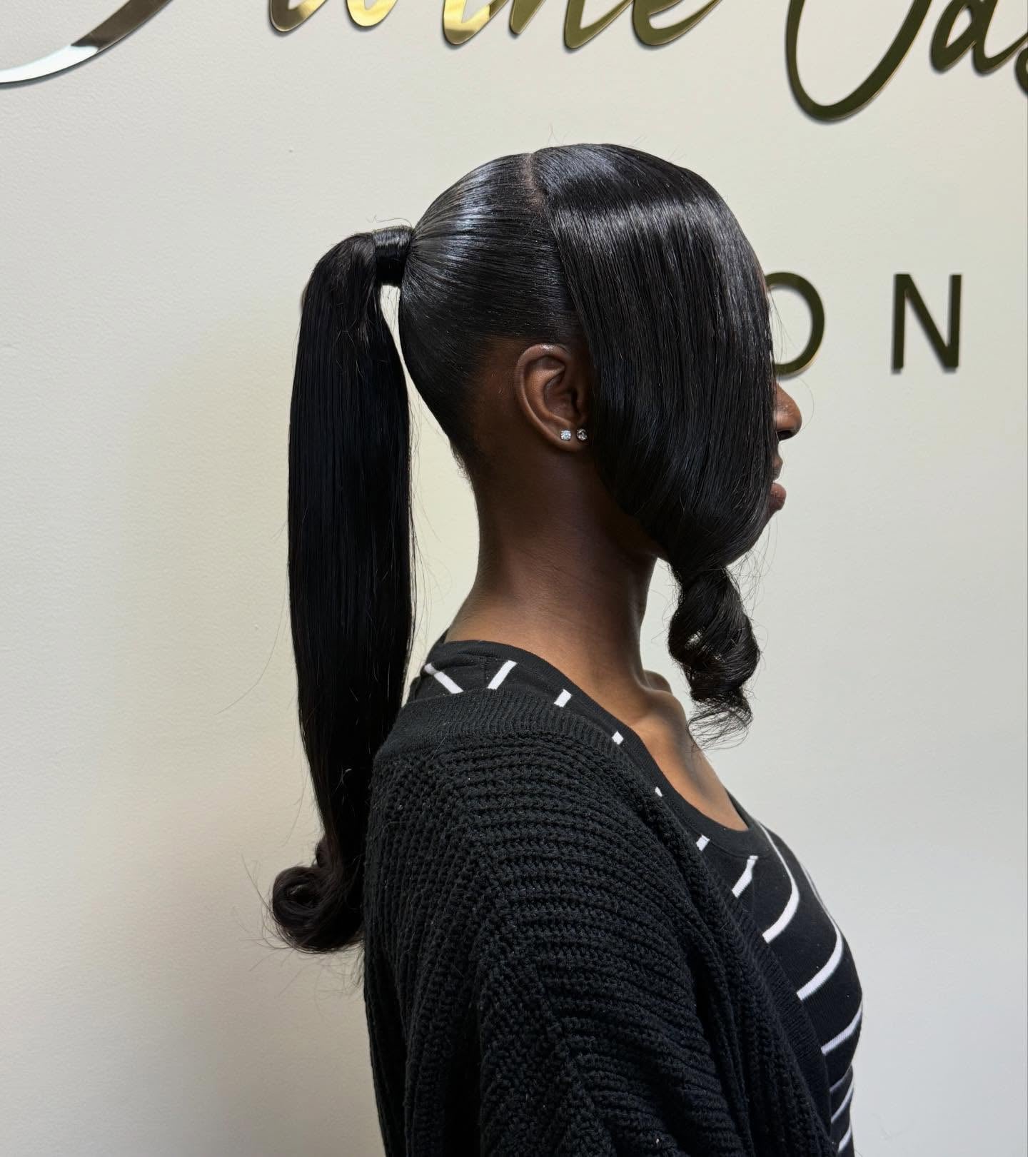 Low Sleek Black Ponytail with Curled End