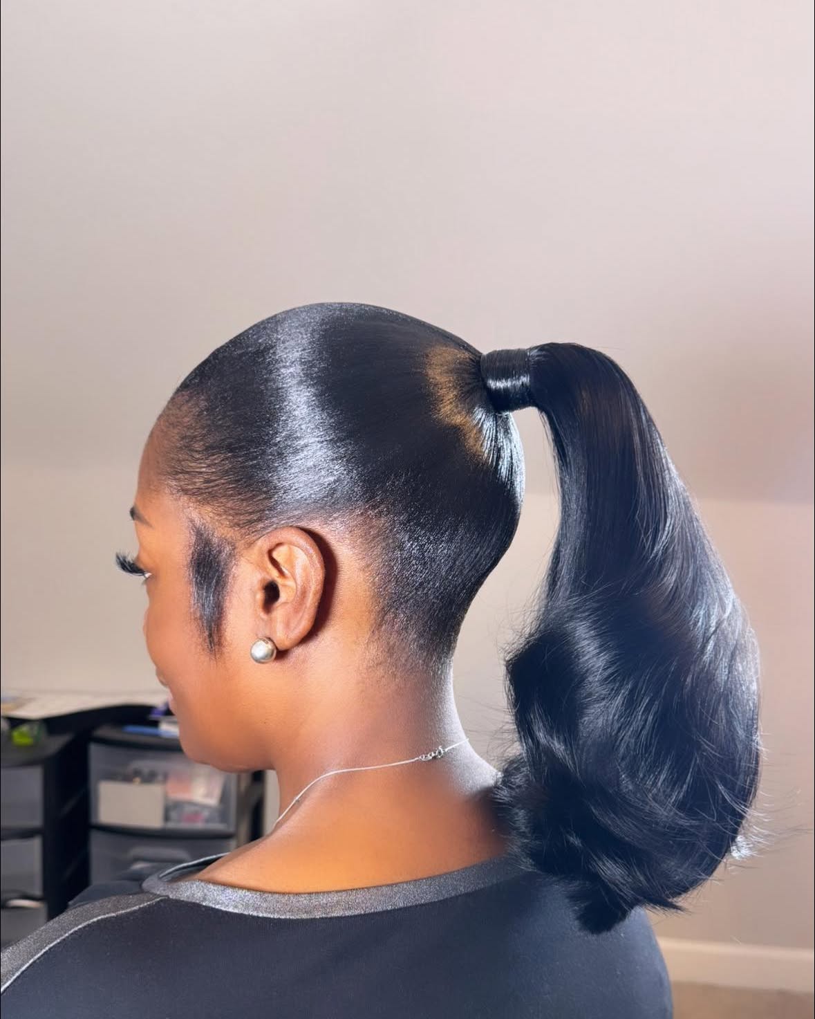 Mid-High Sleek Ponytail with Bouncy Flipped Ends
