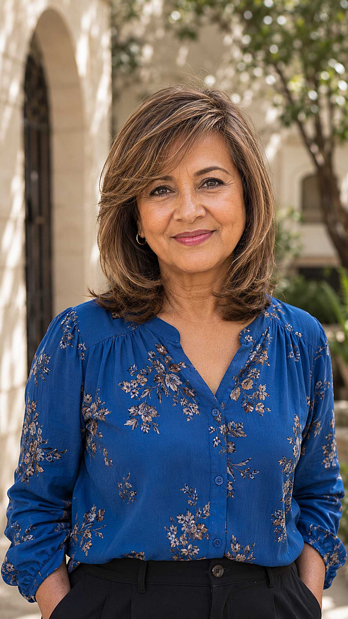 Polished medium bob with warm honey highlights on brown hair