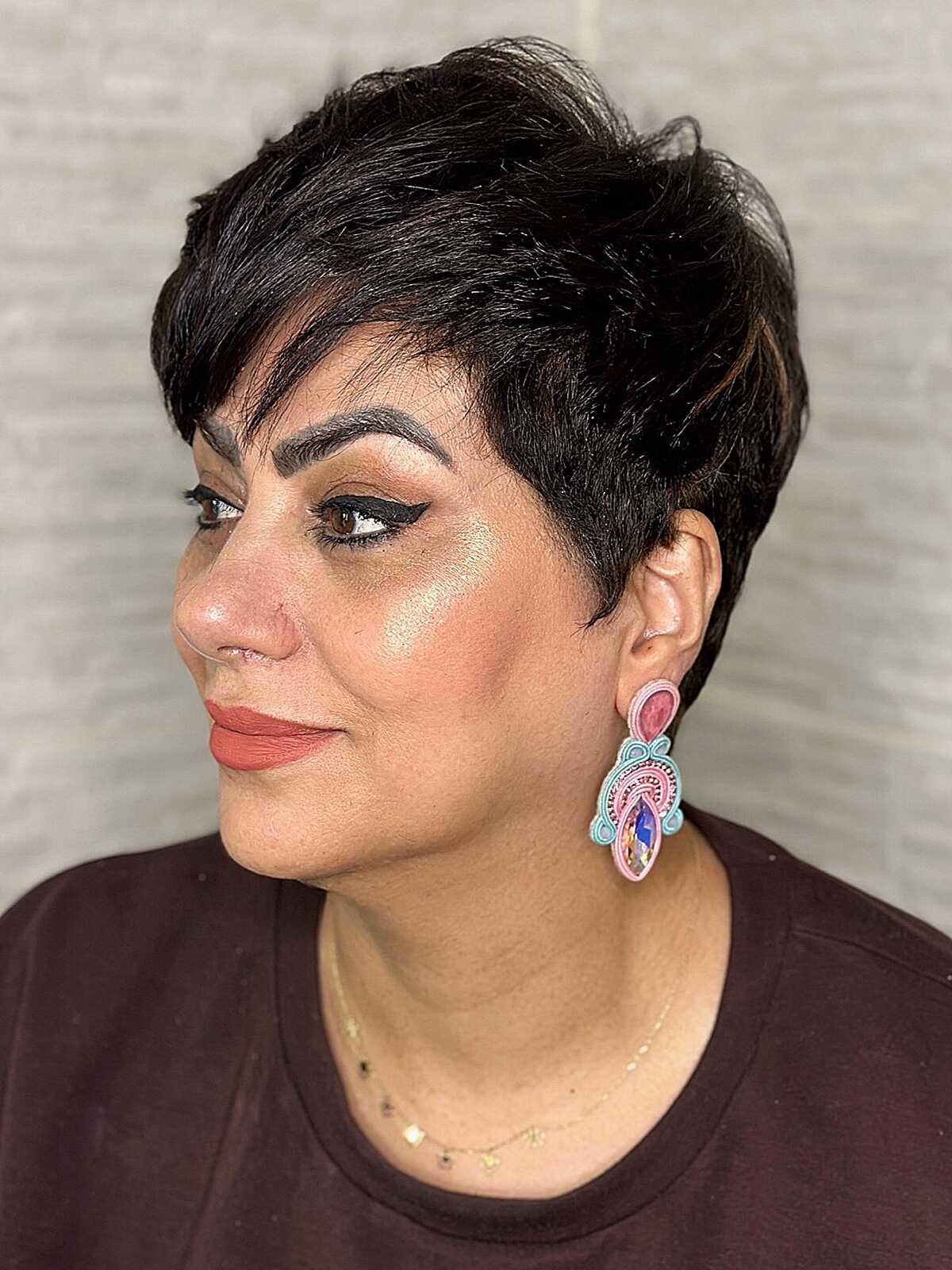 Polished dark pixie with feathered layers on top