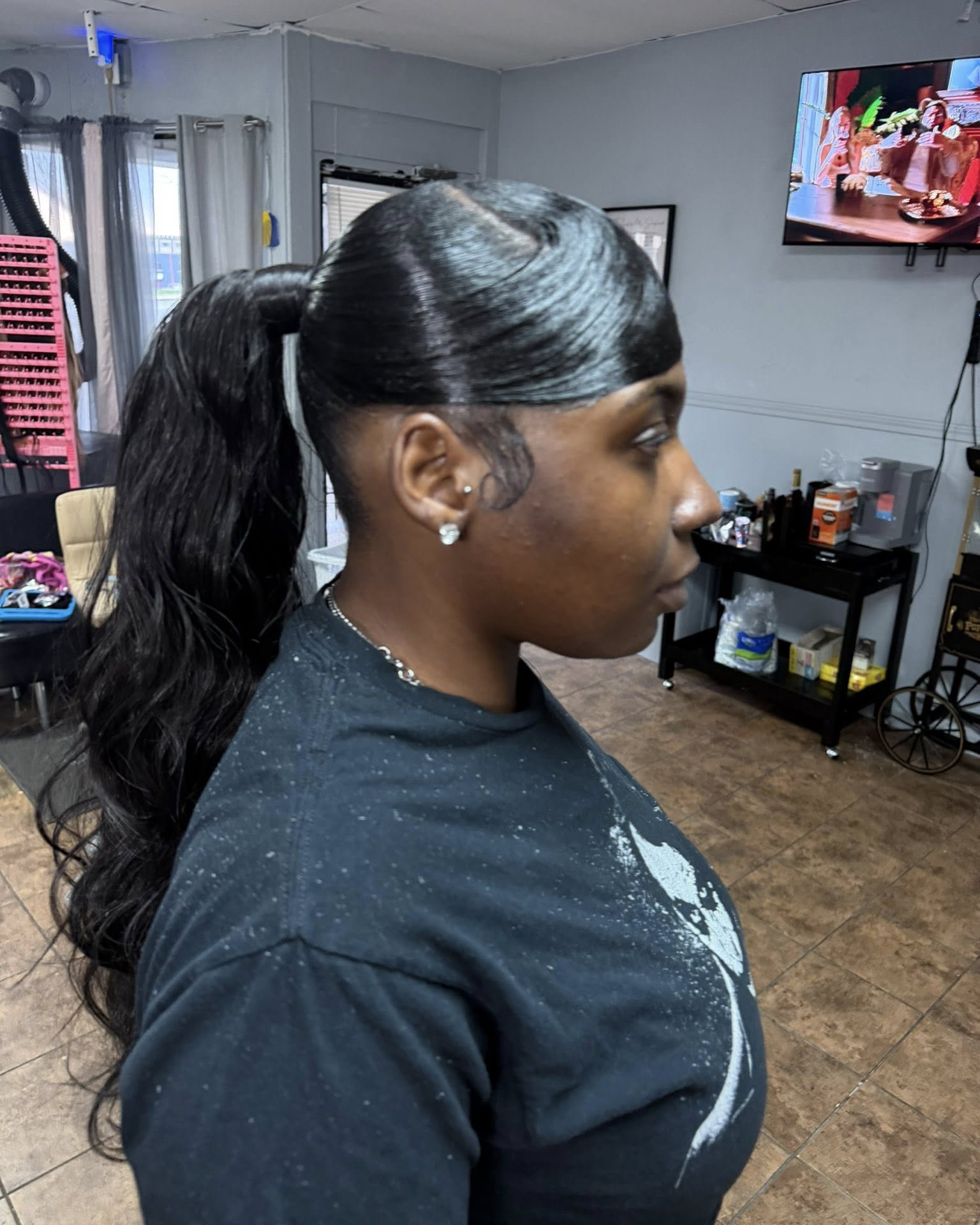 Sleek Mid-High Ponytail with Body Wave Ends