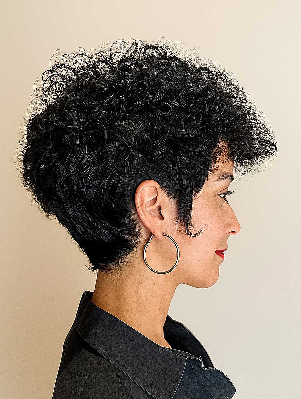 Short black curly pixie with rounded shape and volume