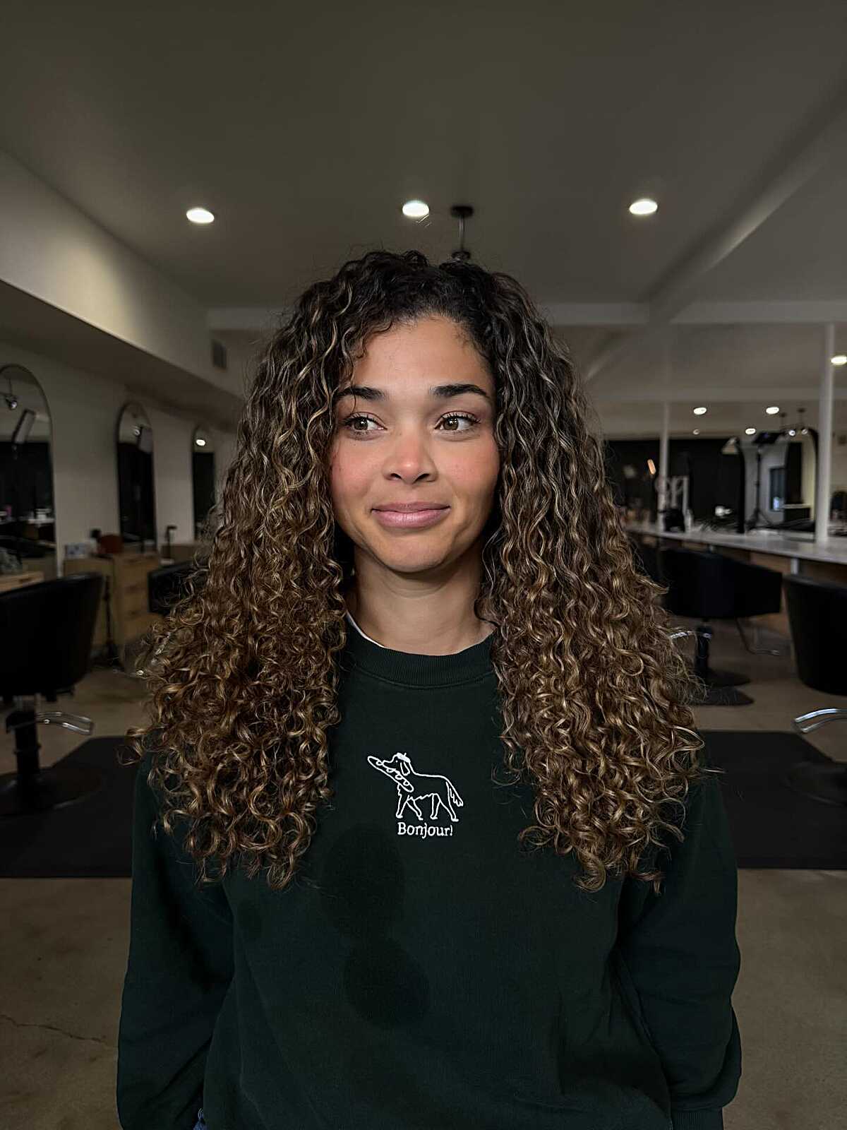 Long Natural Curls with Golden Blonde Balayage