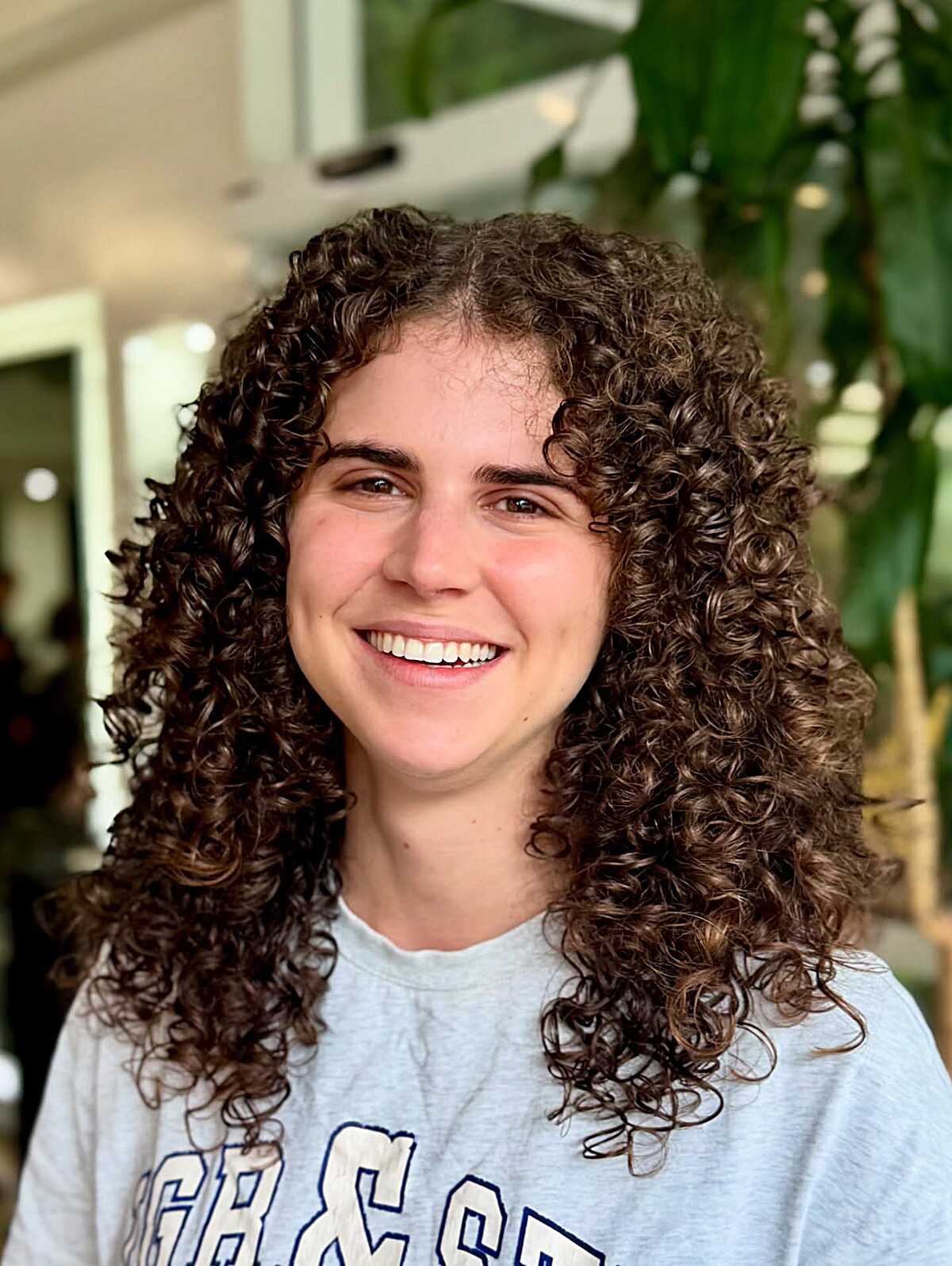 Voluminous Medium Brown Spiral Curls Past Shoulders