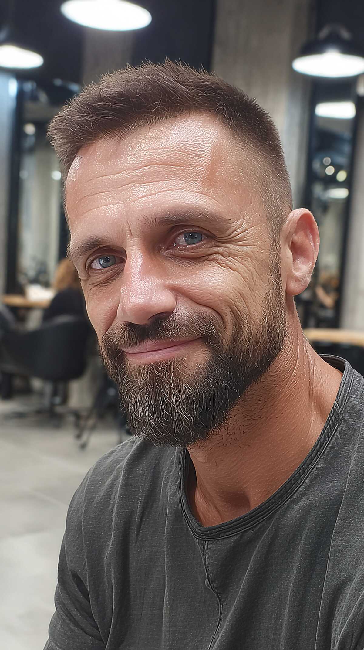 Short crew cut with textured fringe and full beard