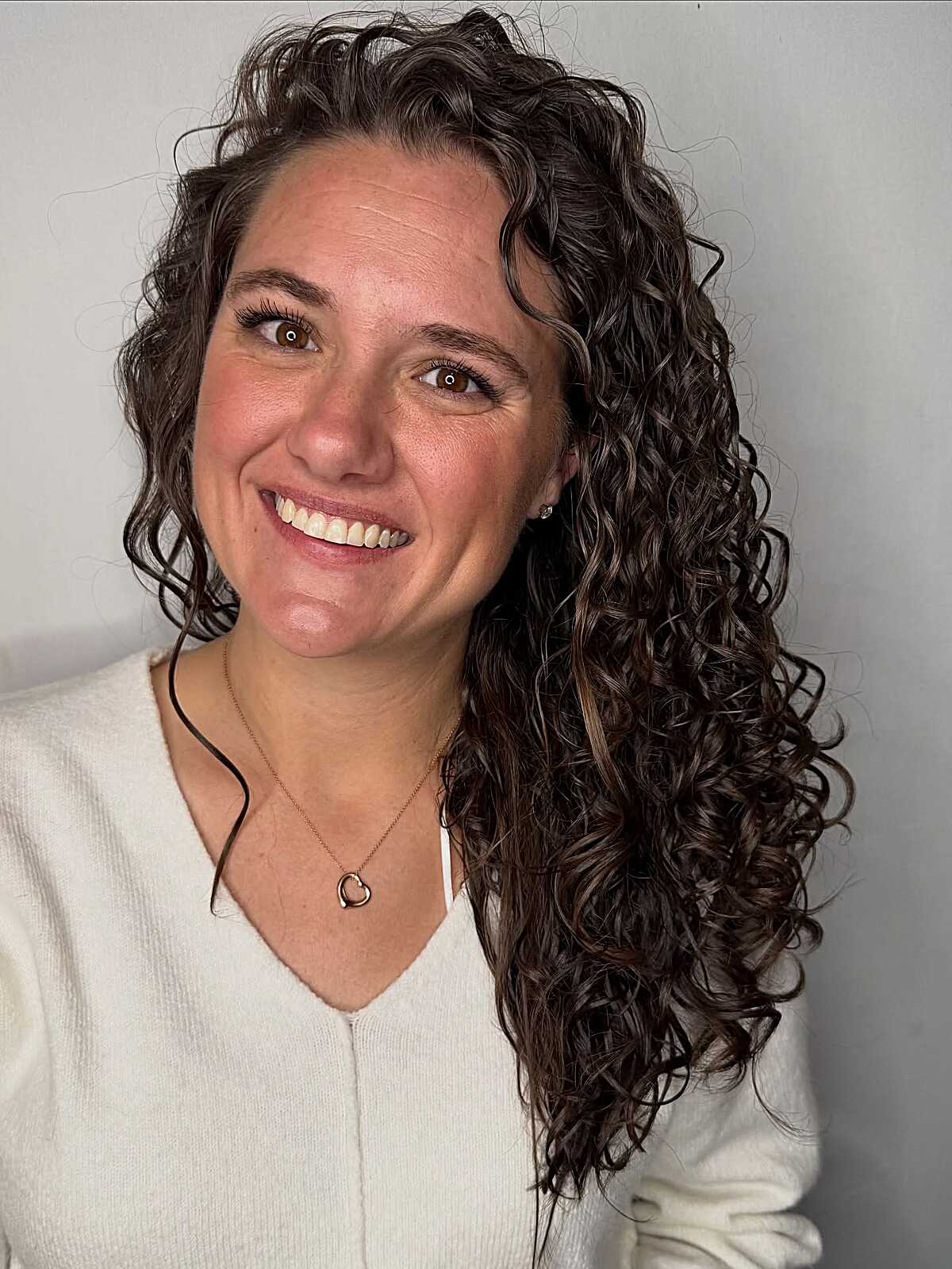 Long Side-Swept Dark Curls with Shine and Depth